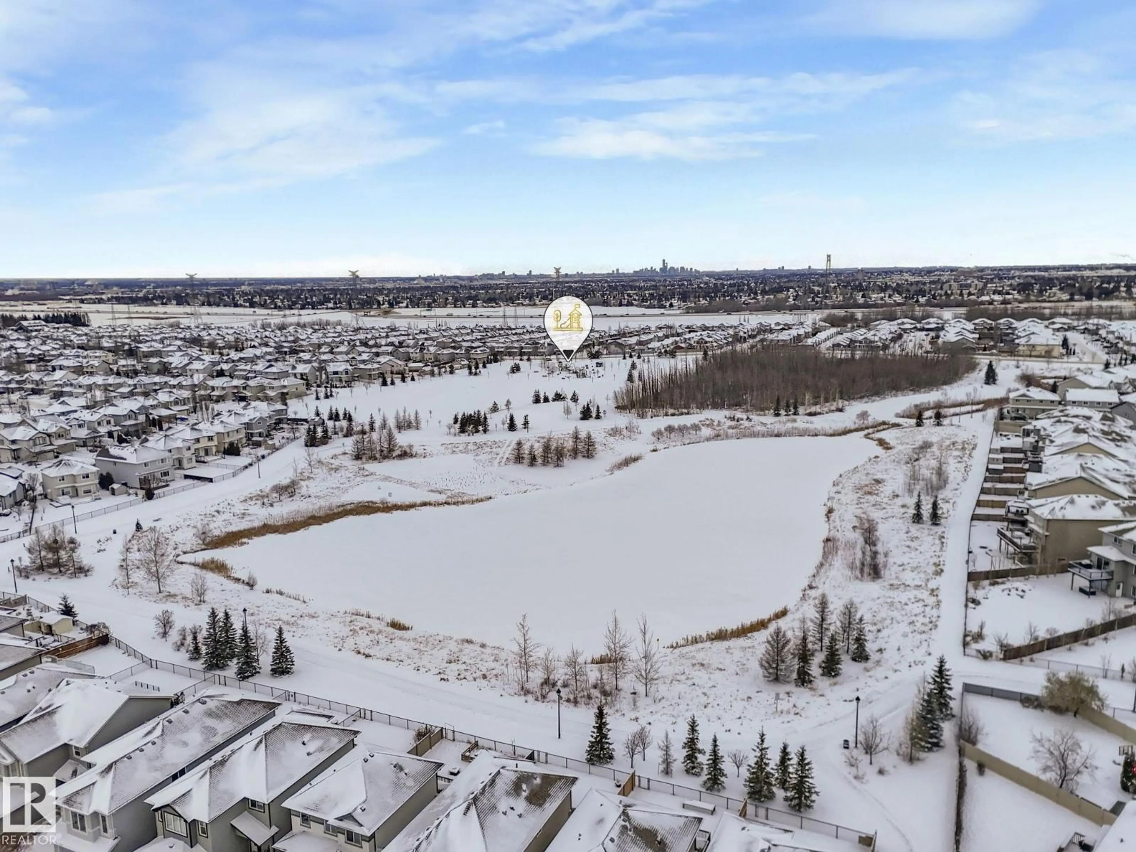 A pic from outside/outdoor area/front of a property/back of a property/a pic from drone, water/lake/river/ocean view for SW - 540 59 ST, Edmonton Alberta T6X0E9
