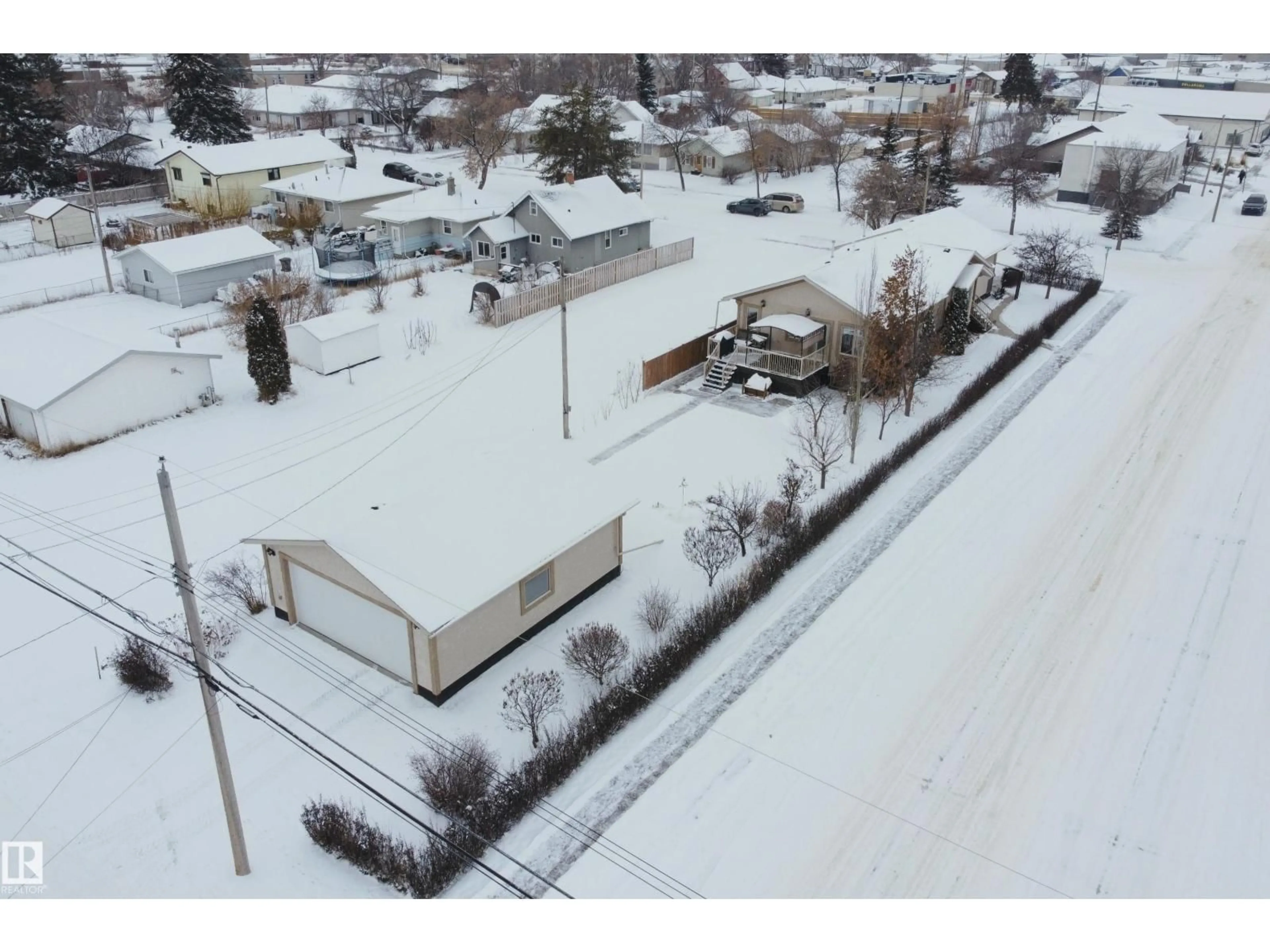 A pic from outside/outdoor area/front of a property/back of a property/a pic from drone, building for 5125 48 ST, Barrhead Alberta T7N1H2