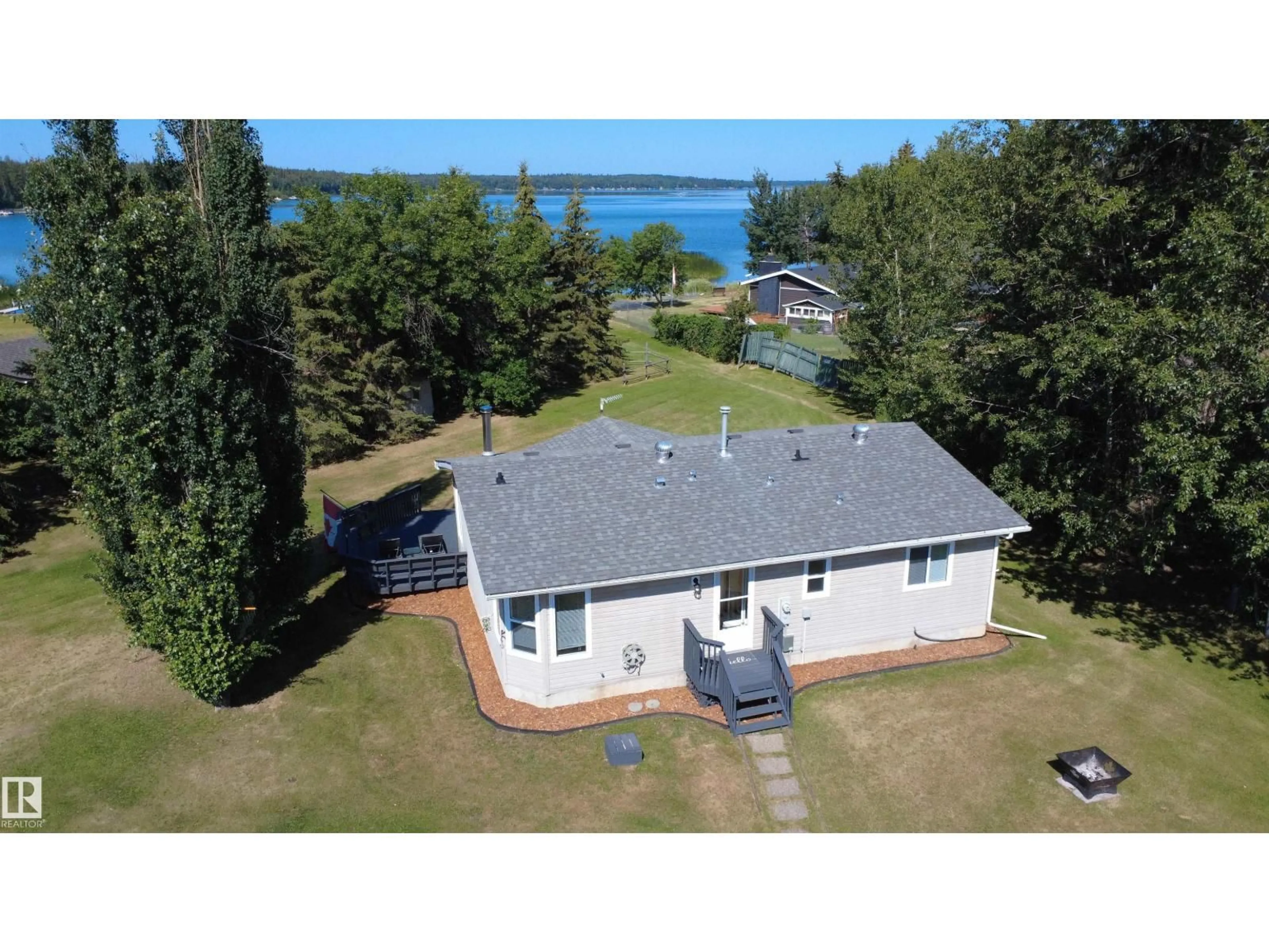 A pic from outside/outdoor area/front of a property/back of a property/a pic from drone, water/lake/river/ocean view for 215 LABONTE DR, Rural Athabasca County Alberta T0A0M0