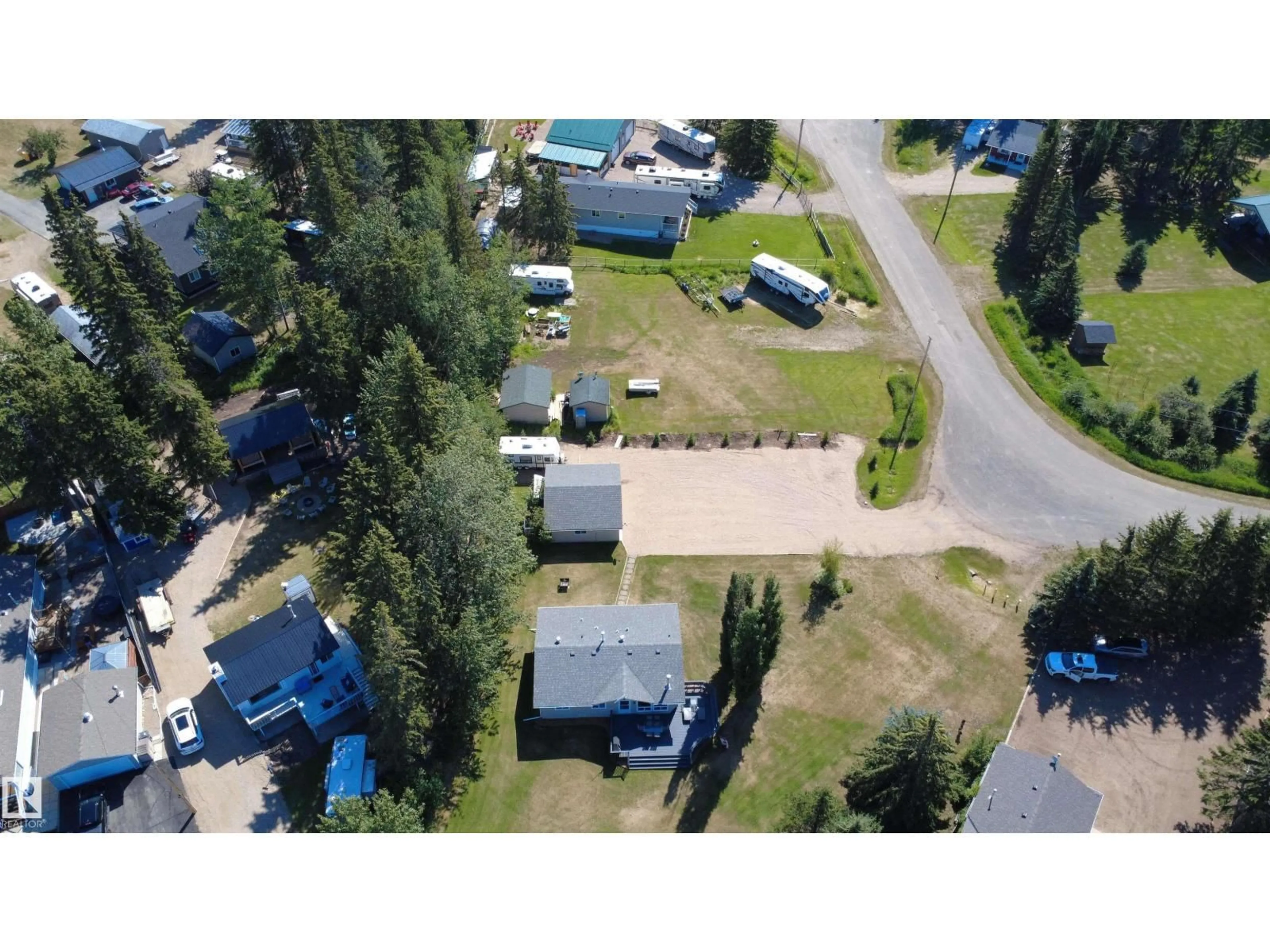 A pic from outside/outdoor area/front of a property/back of a property/a pic from drone, street for 215 LABONTE DR, Rural Athabasca County Alberta T0A0M0