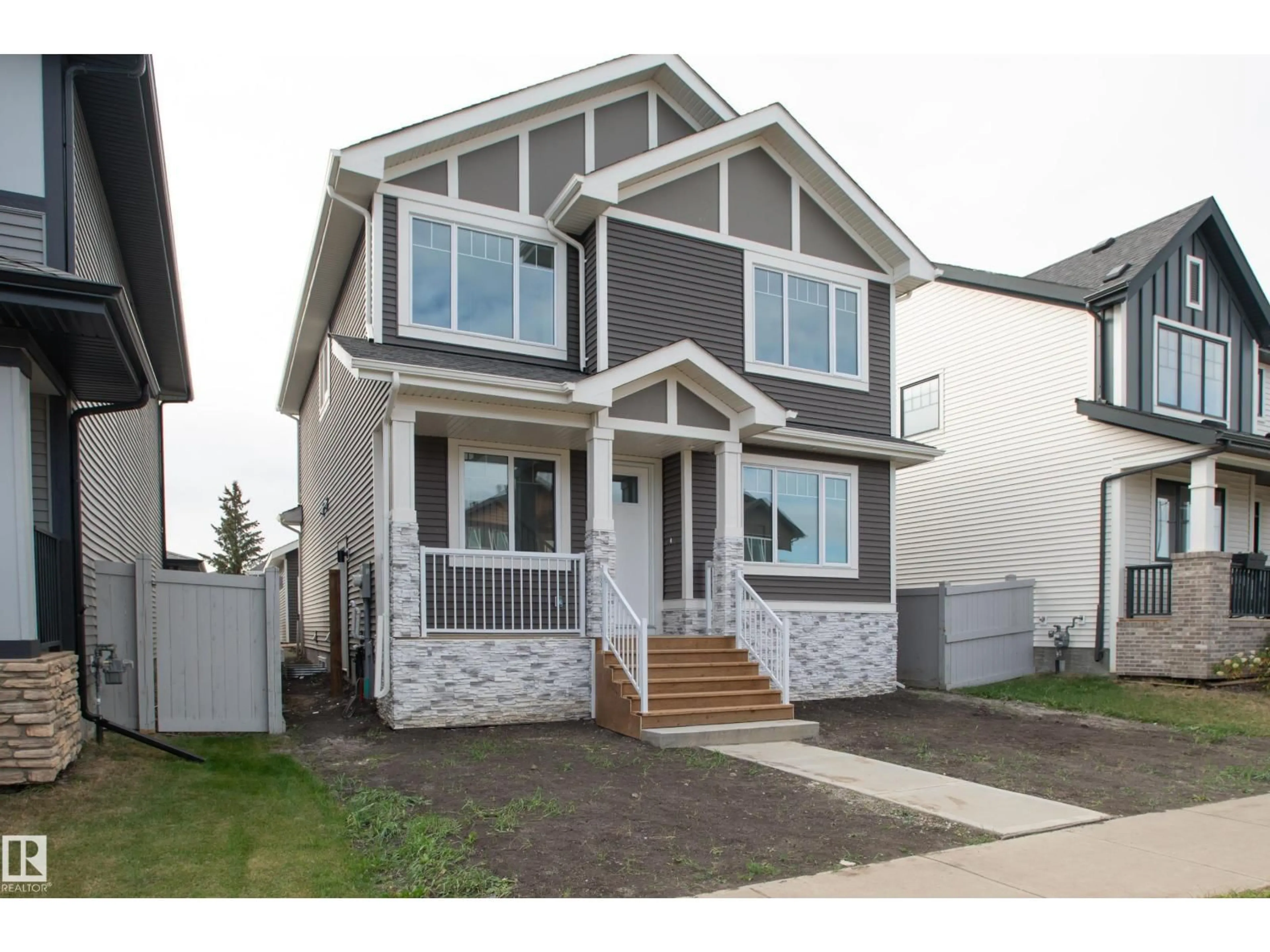 Home with vinyl exterior material, street for 6229 HAMPTON GRAY AV, Edmonton Alberta T5E6X7