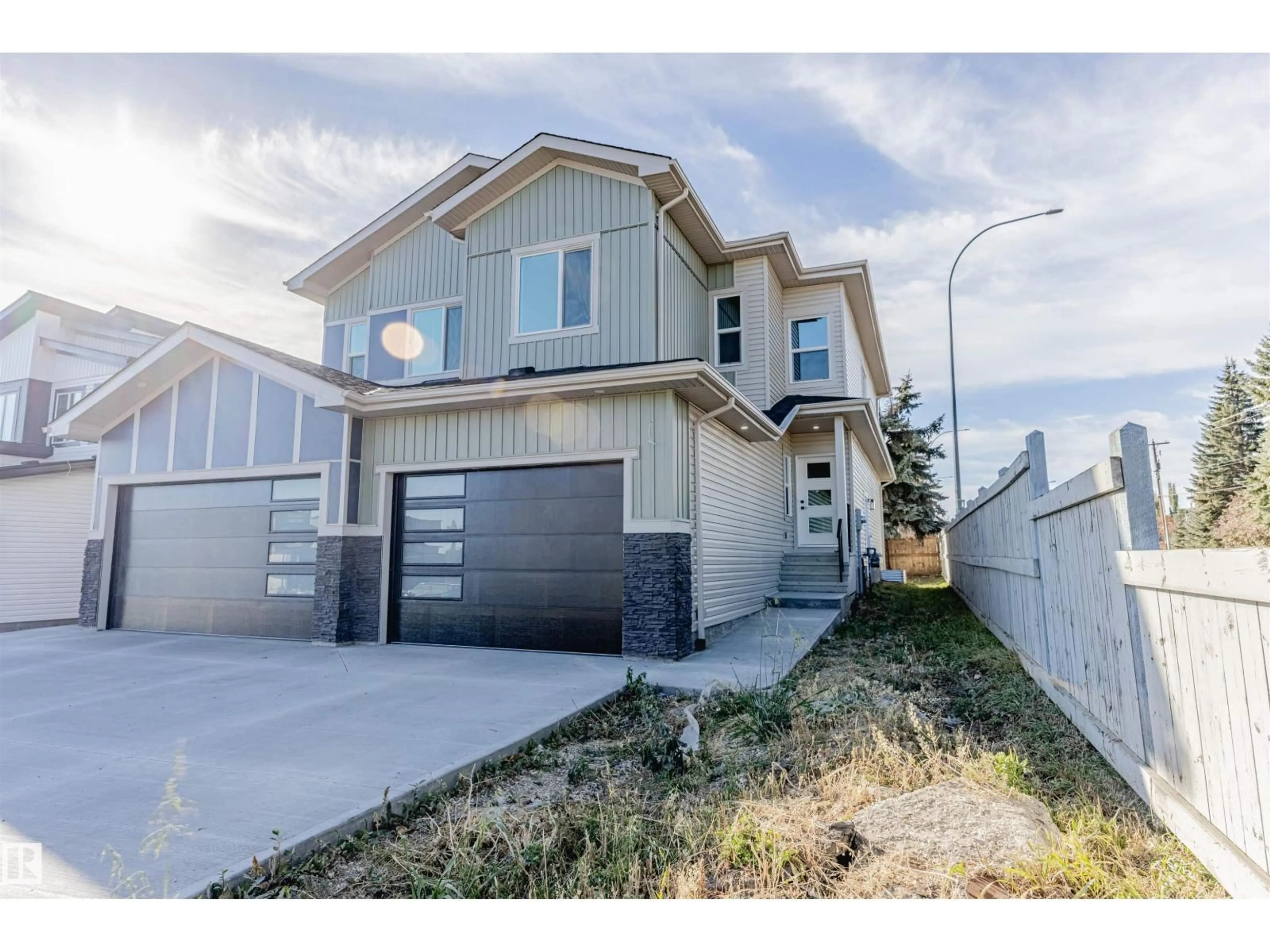 Home with vinyl exterior material, street for 4912 46 ST, Beaumont Alberta T6X1H9