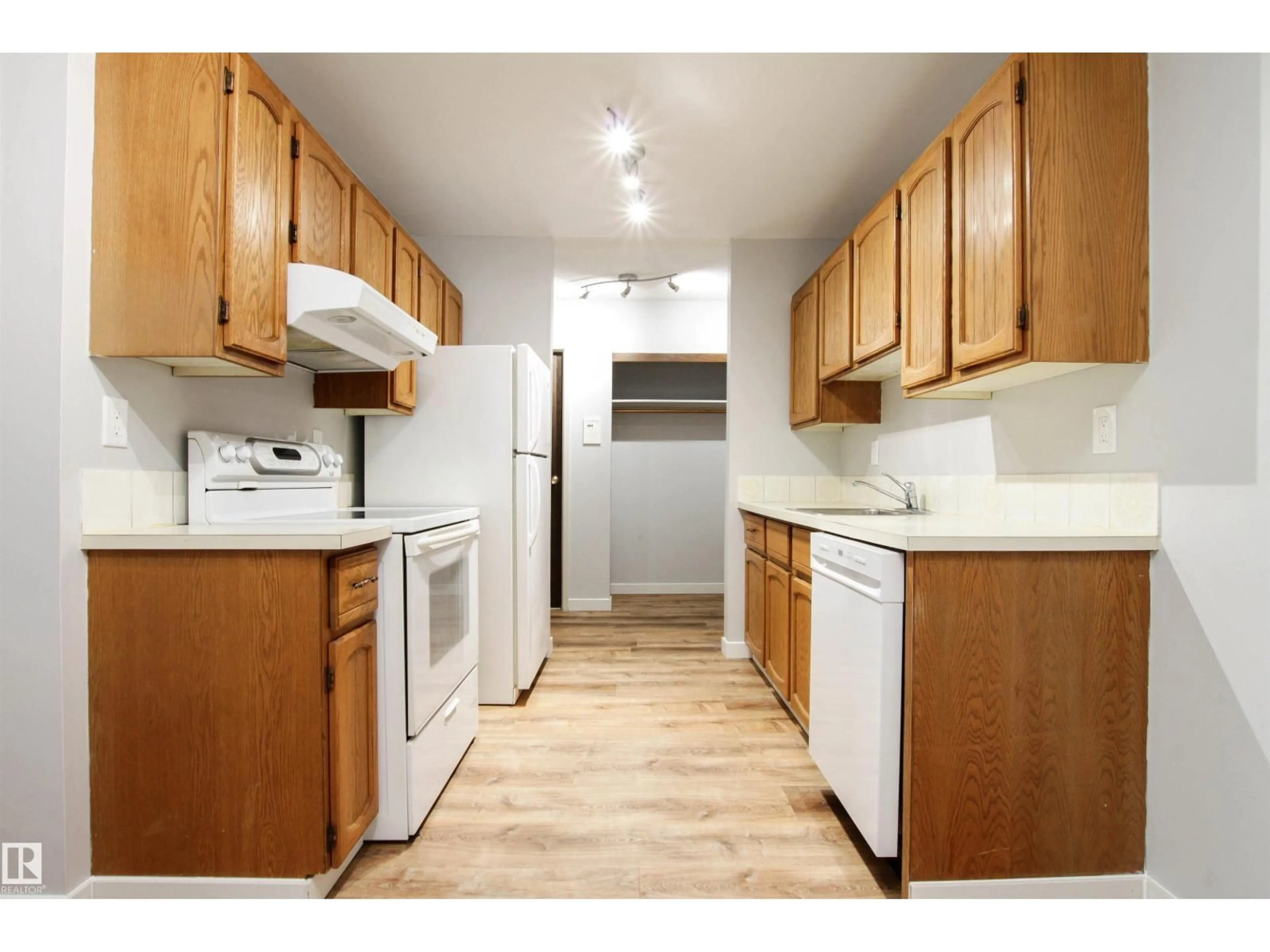 Standard kitchen, wood/laminate floor for #108 - 3610 43 AV NW, Edmonton Alberta T6L5T2