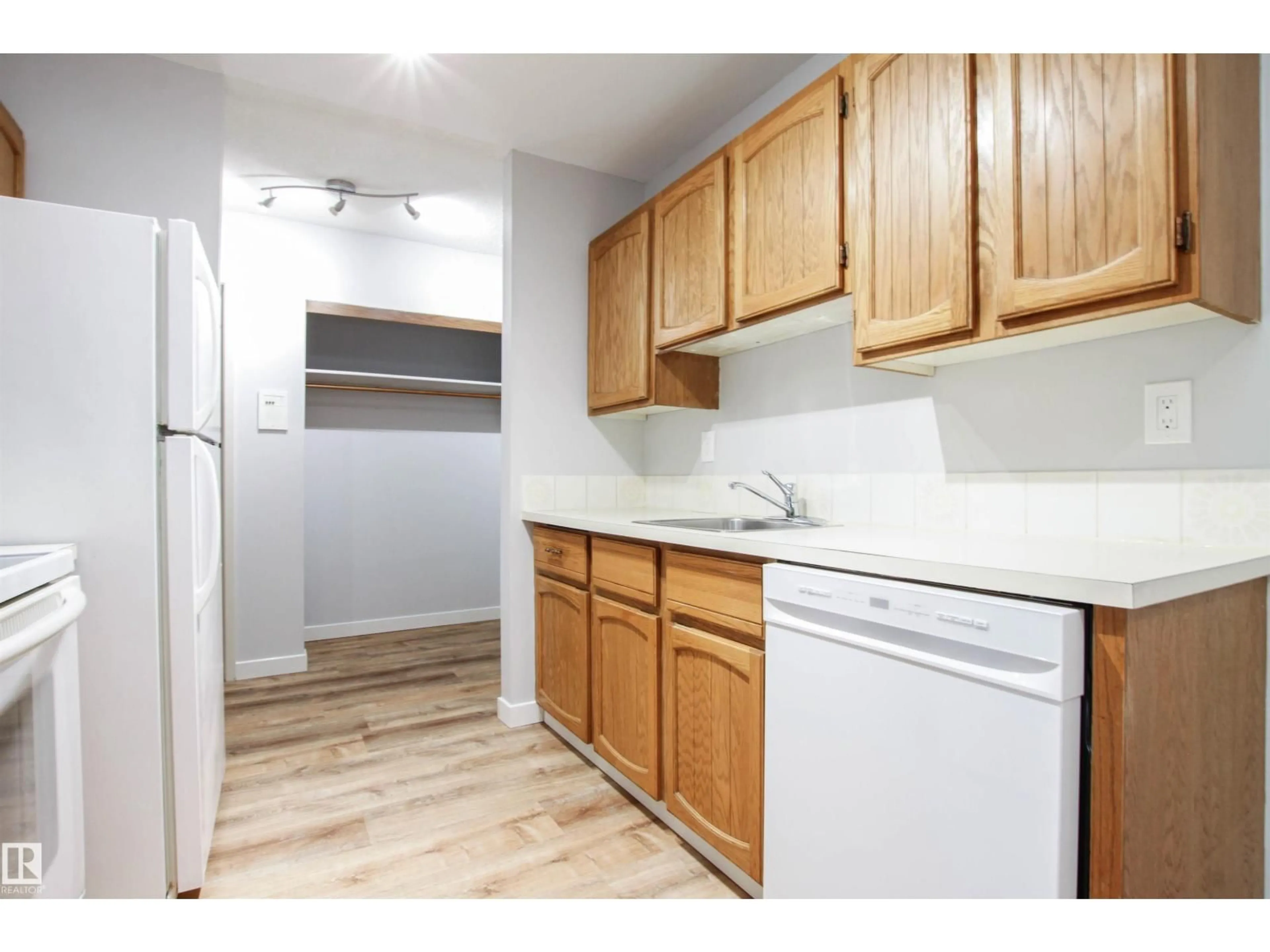 Standard kitchen, wood/laminate floor for #108 - 3610 43 AV NW, Edmonton Alberta T6L5T2