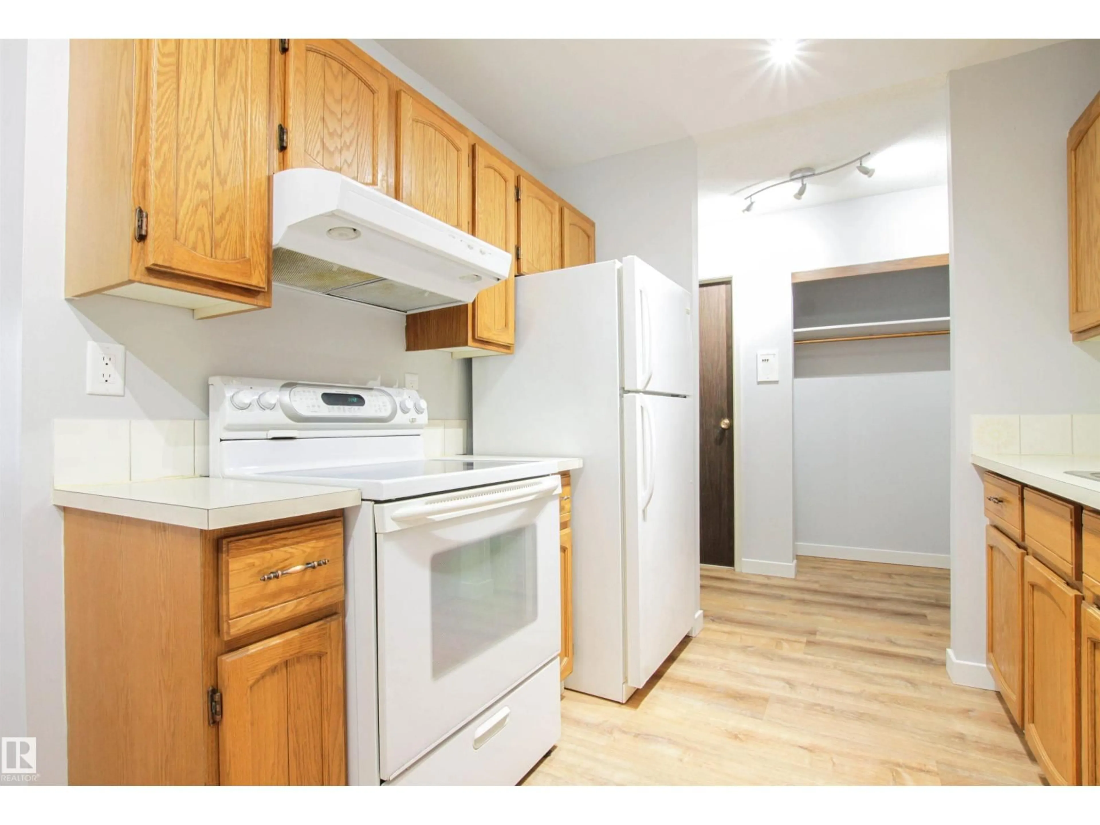 Standard kitchen, wood/laminate floor for #108 - 3610 43 AV NW, Edmonton Alberta T6L5T2