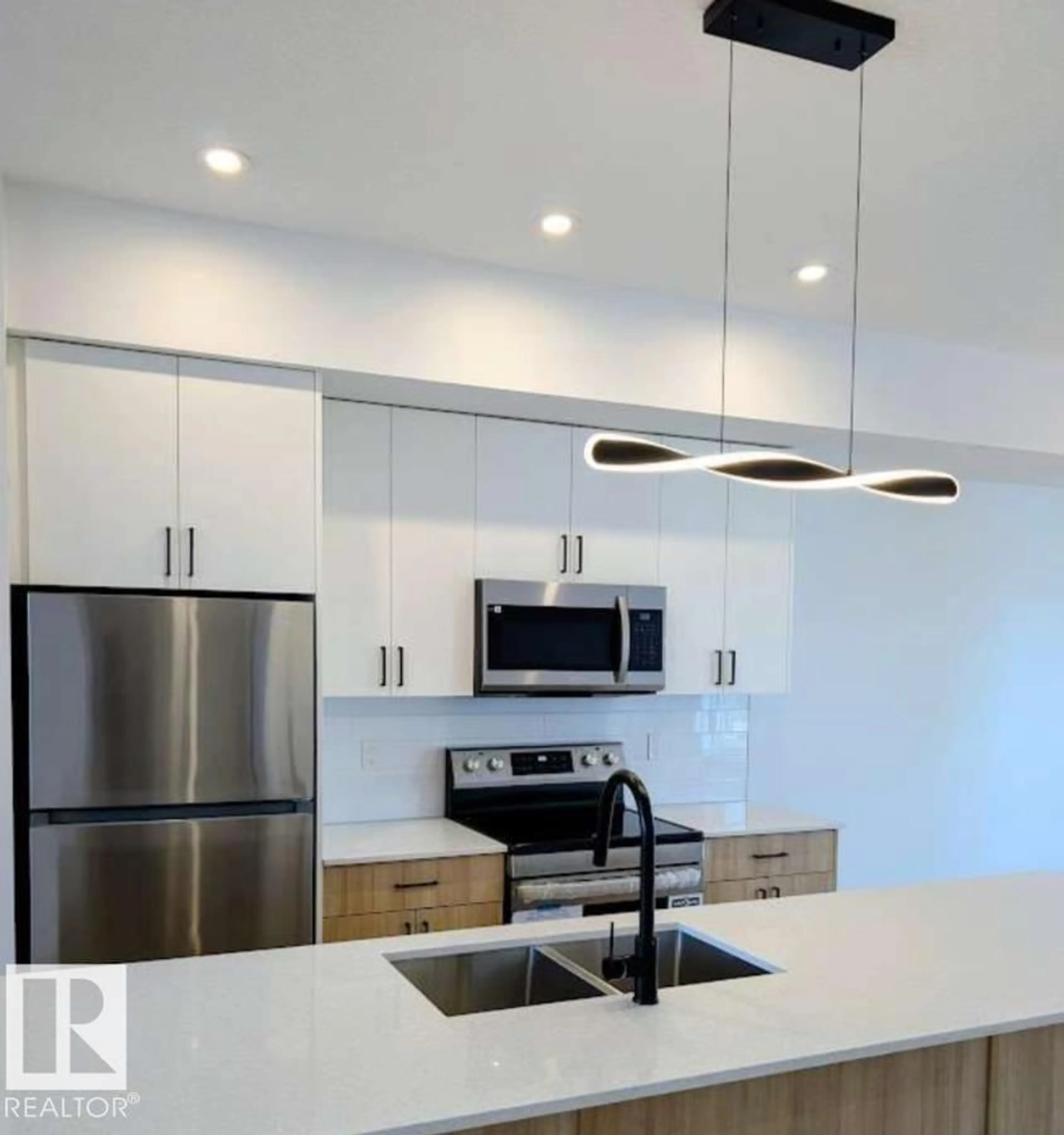 Open concept kitchen, unknown for #49 - 18120 28 AV, Edmonton Alberta T6W4V2