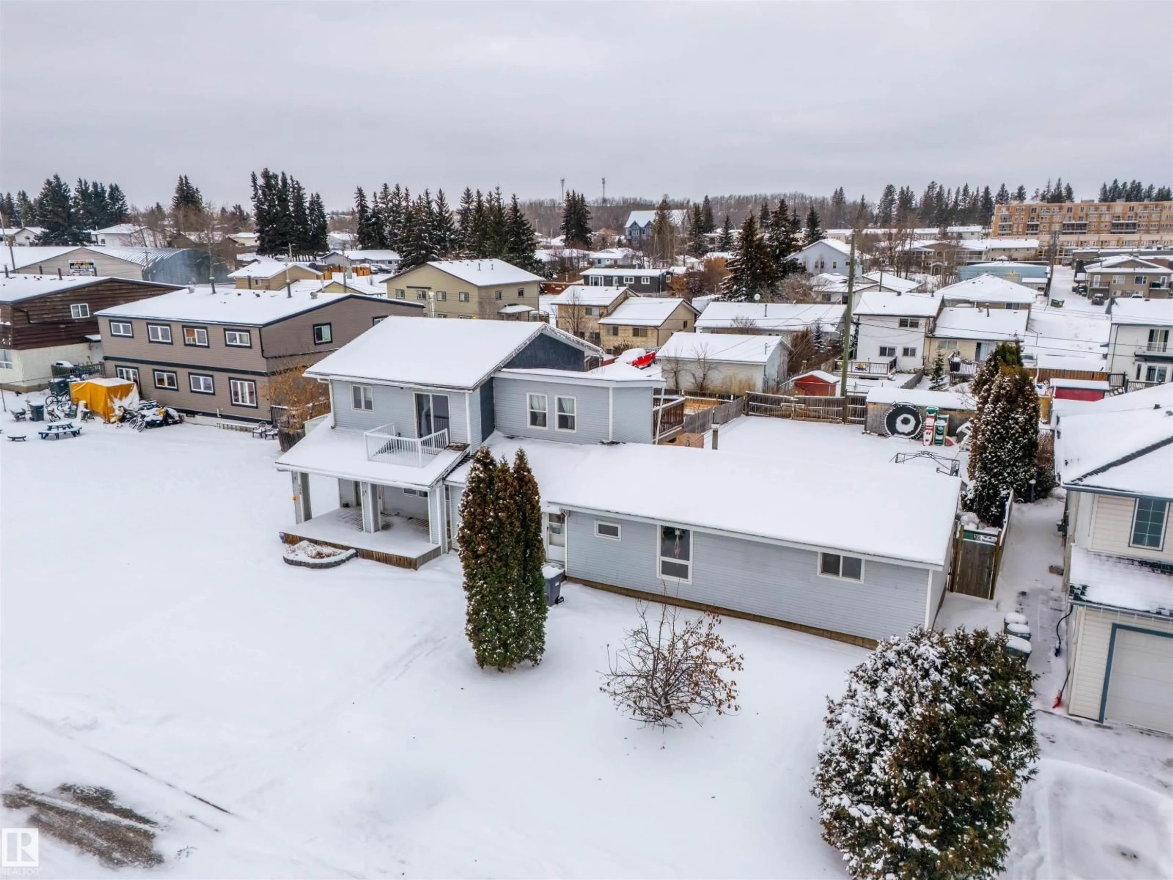 A pic from outside/outdoor area/front of a property/back of a property/a pic from drone, unknown for 907/909 8 ST, Cold Lake Alberta T9M1H7