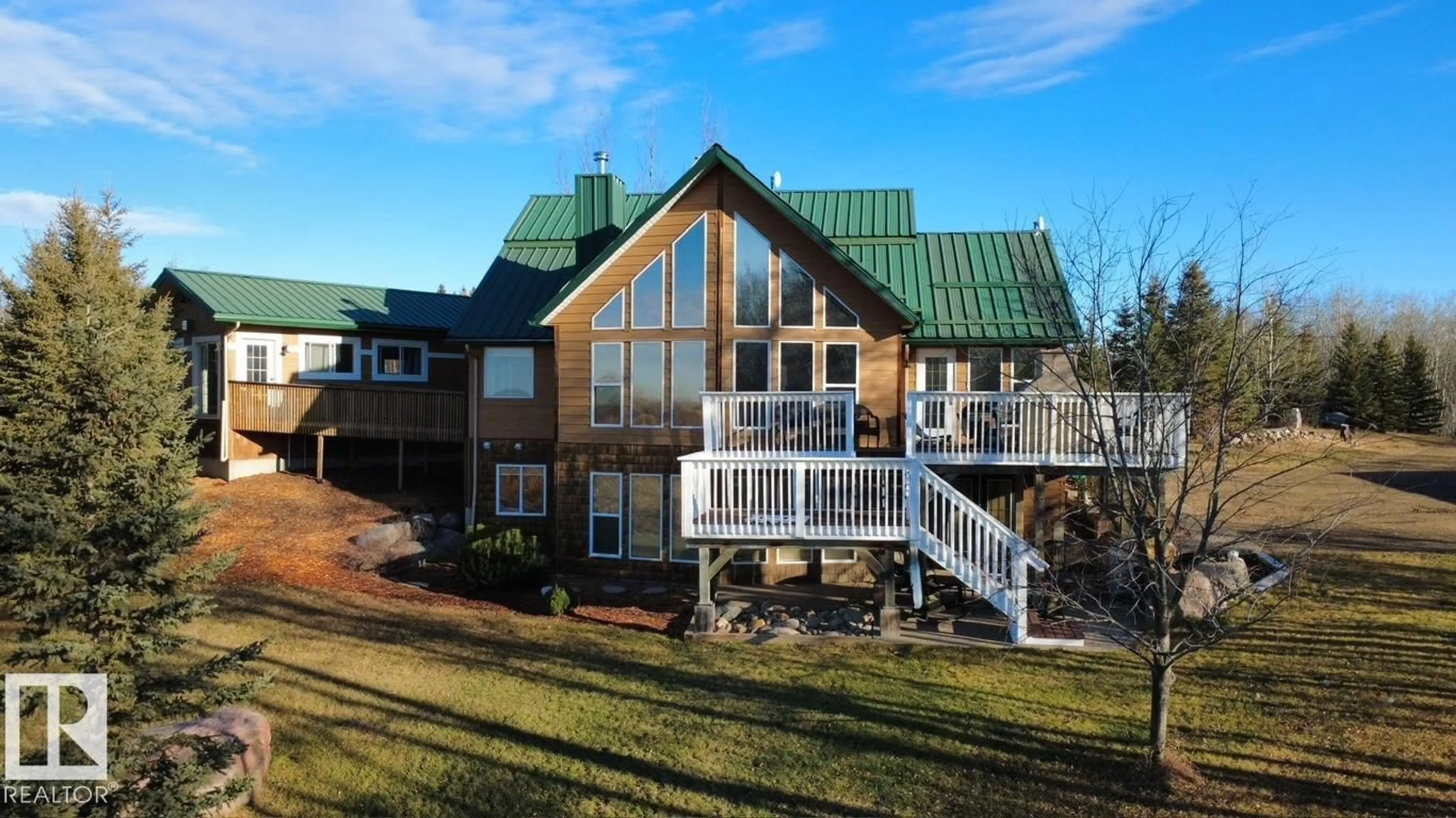 A pic from outside/outdoor area/front of a property/back of a property/a pic from drone, unknown for 120 50434 RGE RD 232, Rural Leduc County Alberta T4X0L1