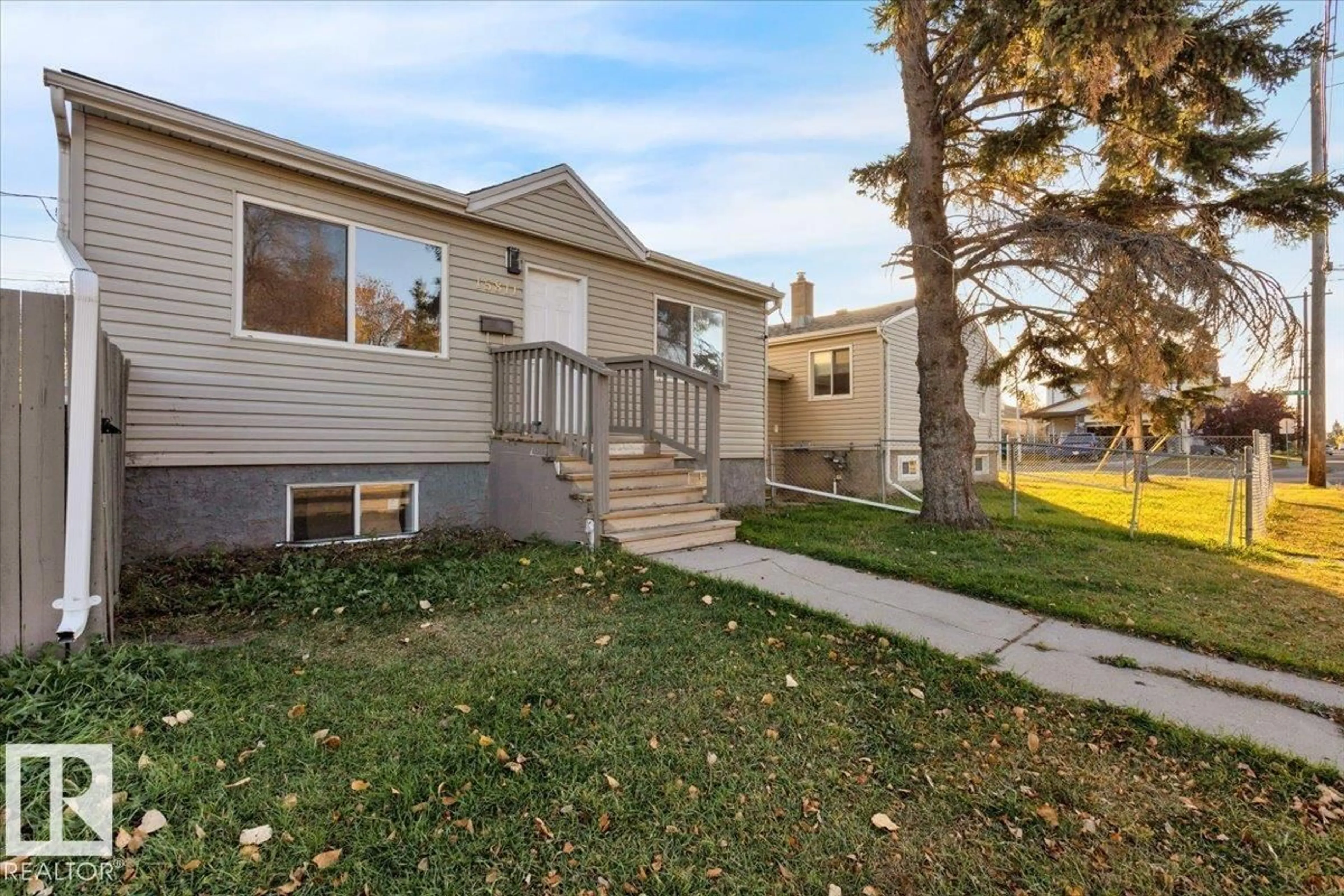 Home with vinyl exterior material, street for 10345 159 ST, Edmonton Alberta T5P3A5