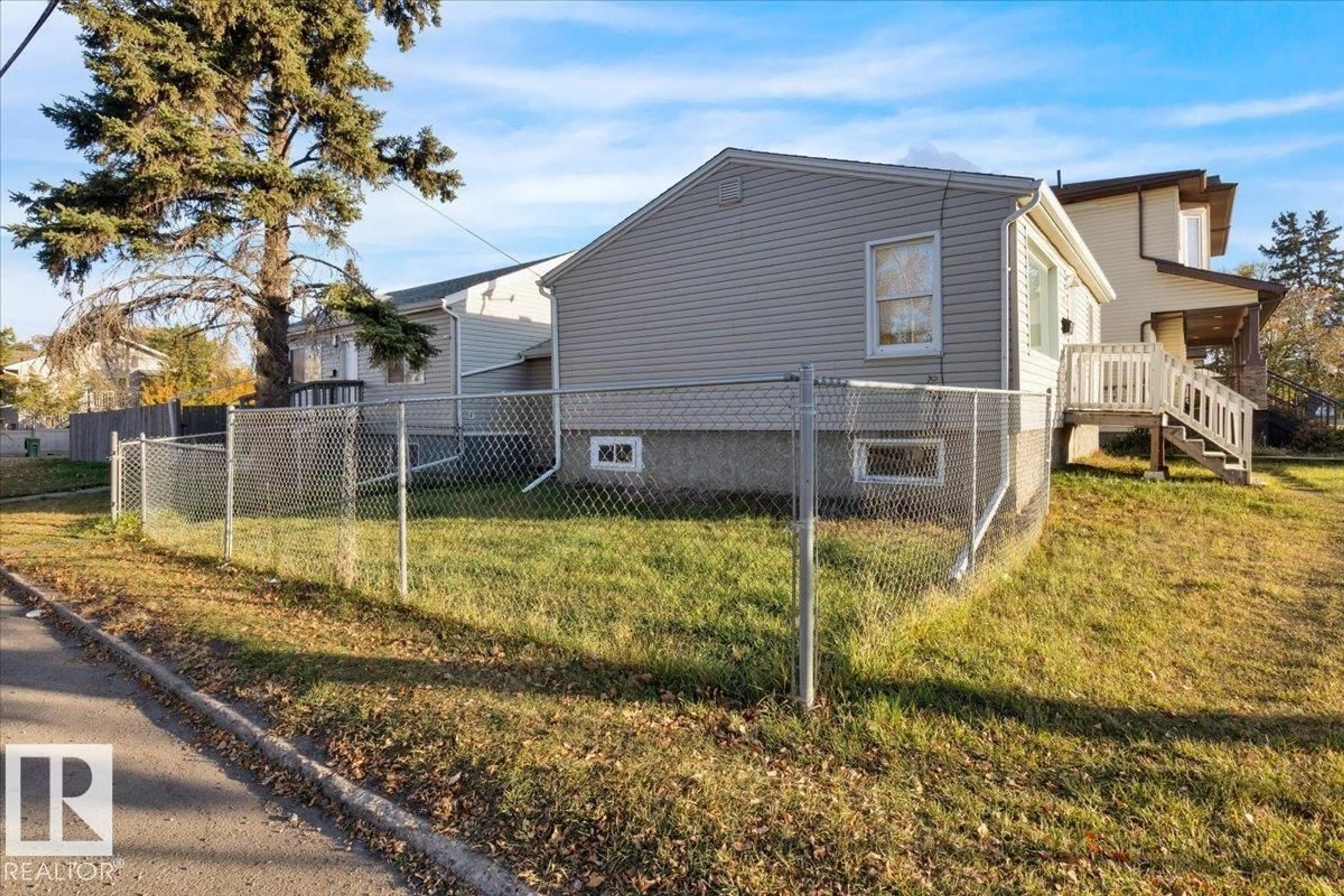 Home with vinyl exterior material, street for 10345 159 ST, Edmonton Alberta T5P3A5