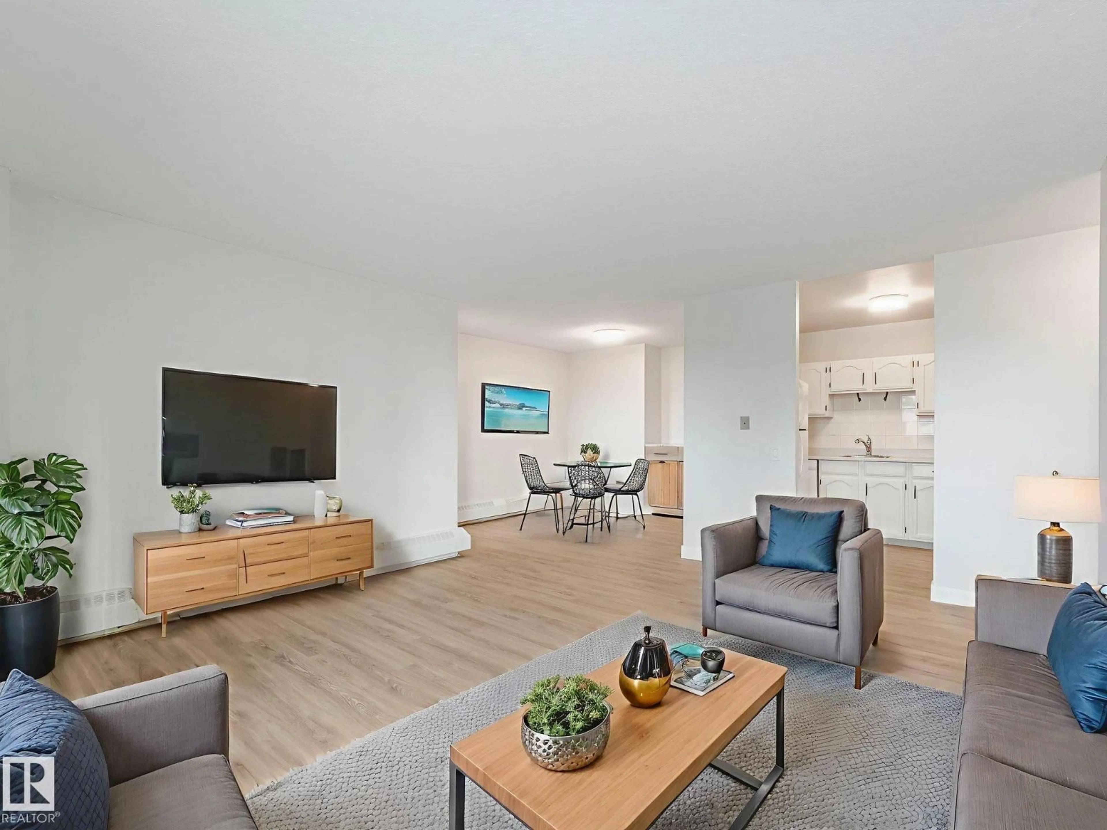 Living room with furniture, wood/laminate floor for #406 - 10125 109 ST, Edmonton Alberta T5J3P1