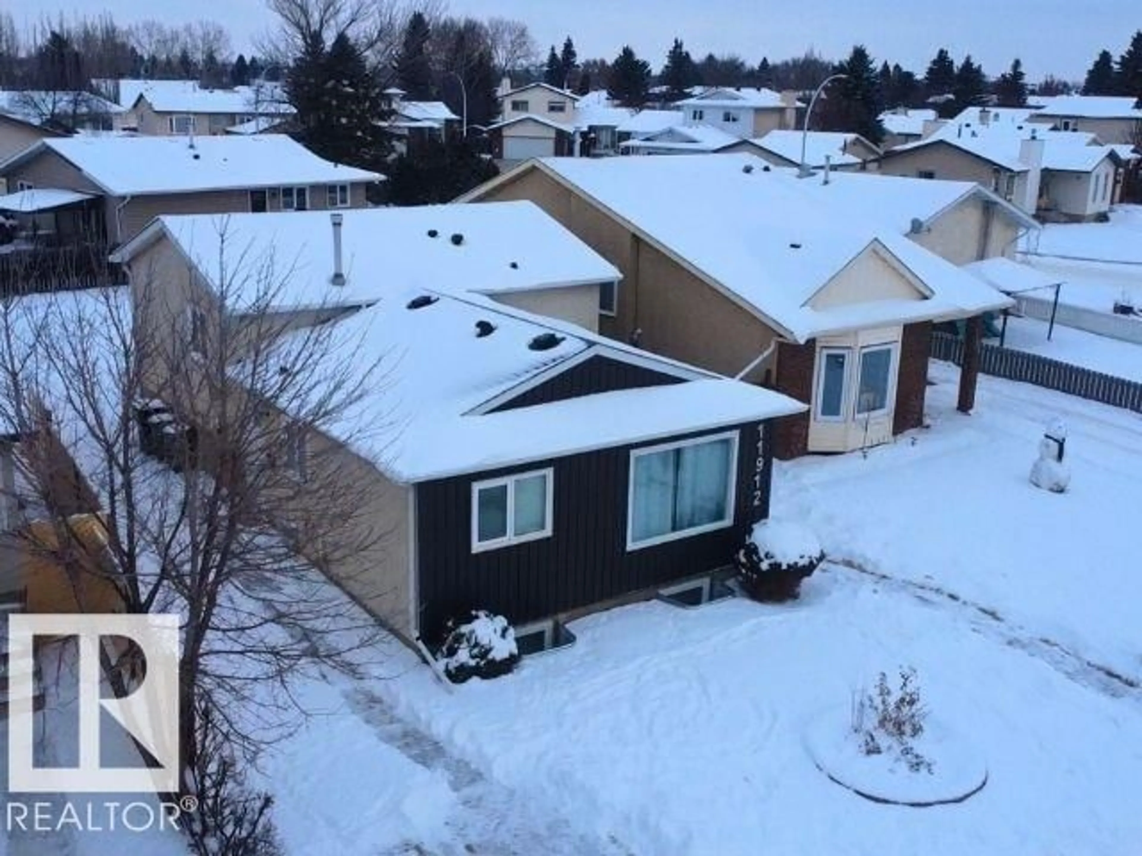 A pic from outside/outdoor area/front of a property/back of a property/a pic from drone, street for 11912 140 AV, Edmonton Alberta T5X5K1