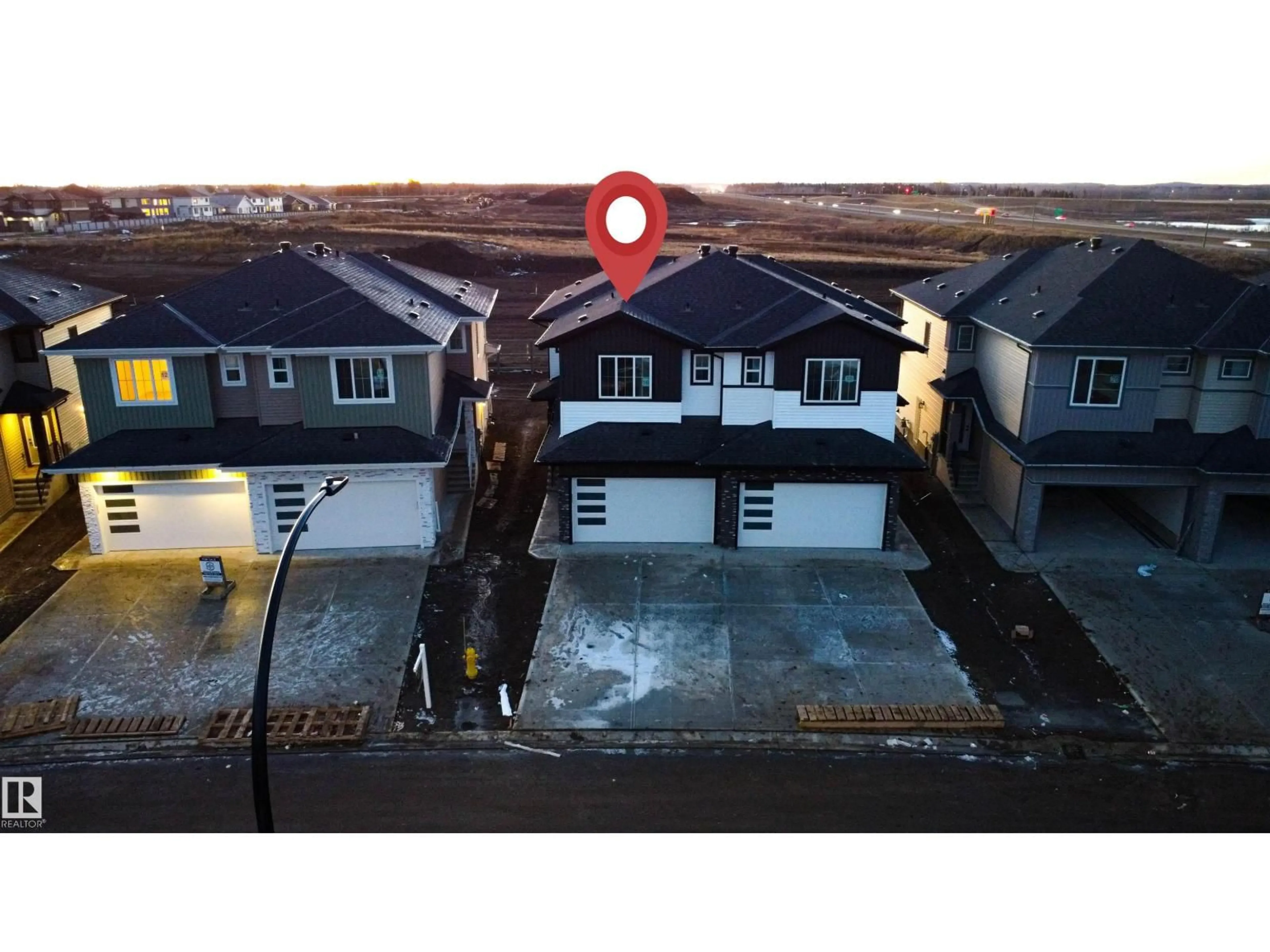 A pic from outside/outdoor area/front of a property/back of a property/a pic from drone, street for 16 AXELWOOD CR, Spruce Grove Alberta T7X4G4
