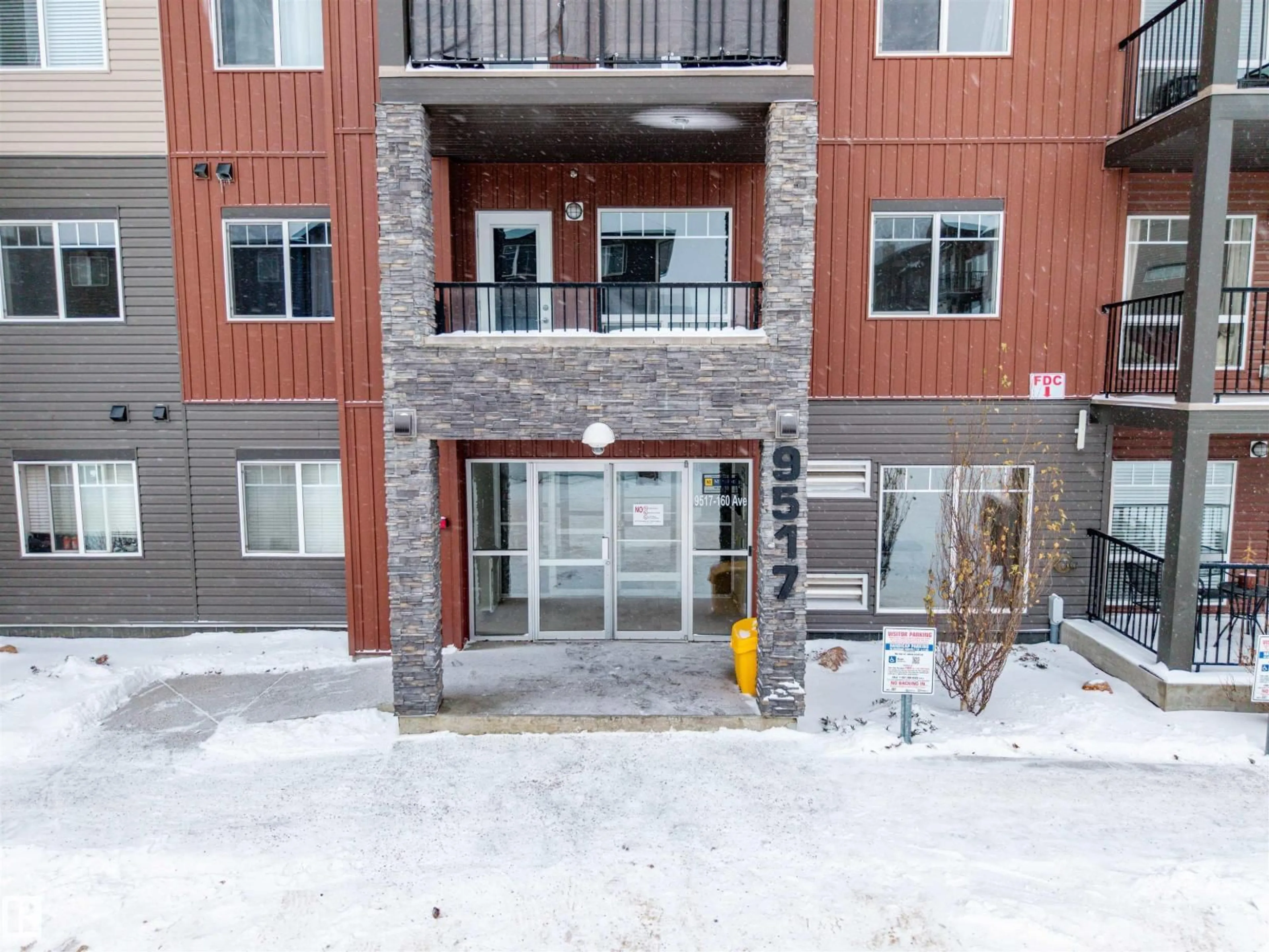 A pic from outside/outdoor area/front of a property/back of a property/a pic from drone, building for #409 - 9517 160 AV, Edmonton Alberta T5Z0N1
