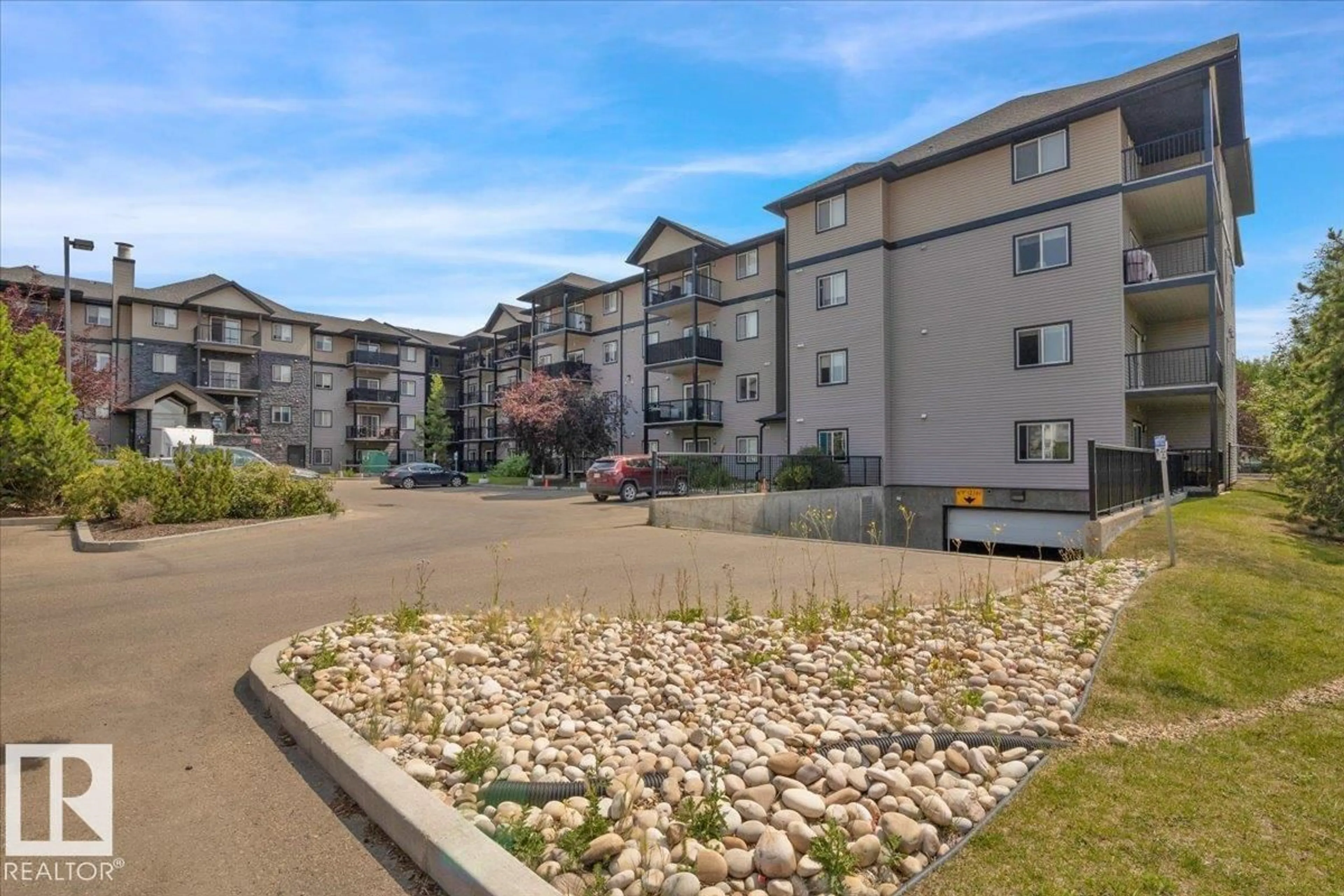 A pic from outside/outdoor area/front of a property/back of a property/a pic from drone, unknown for 219 14808 125 ST NW, Edmonton Alberta T5X0G1