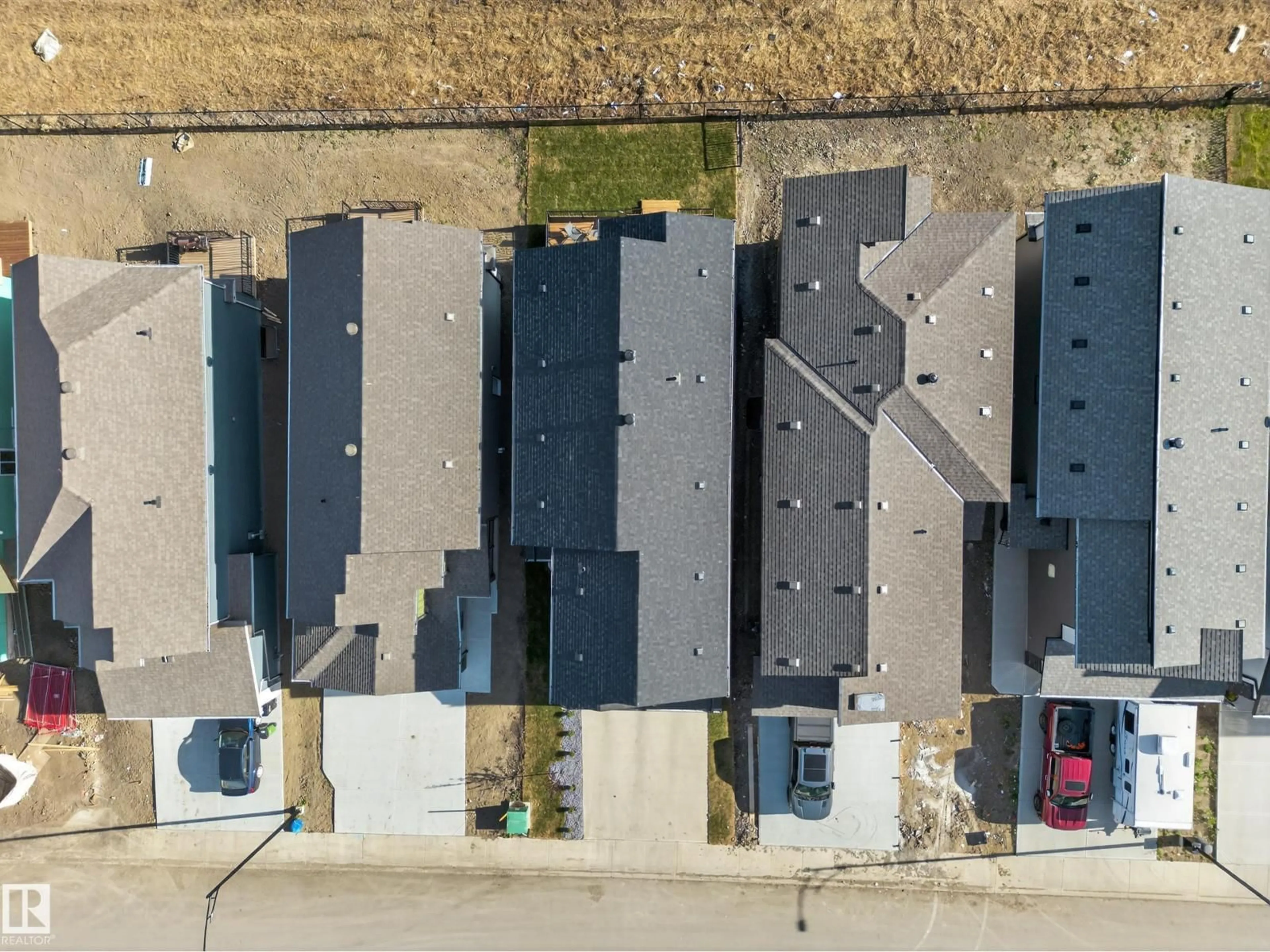 A pic from outside/outdoor area/front of a property/back of a property/a pic from drone, street for NE - 16527 3 ST, Edmonton Alberta T5Y4J2