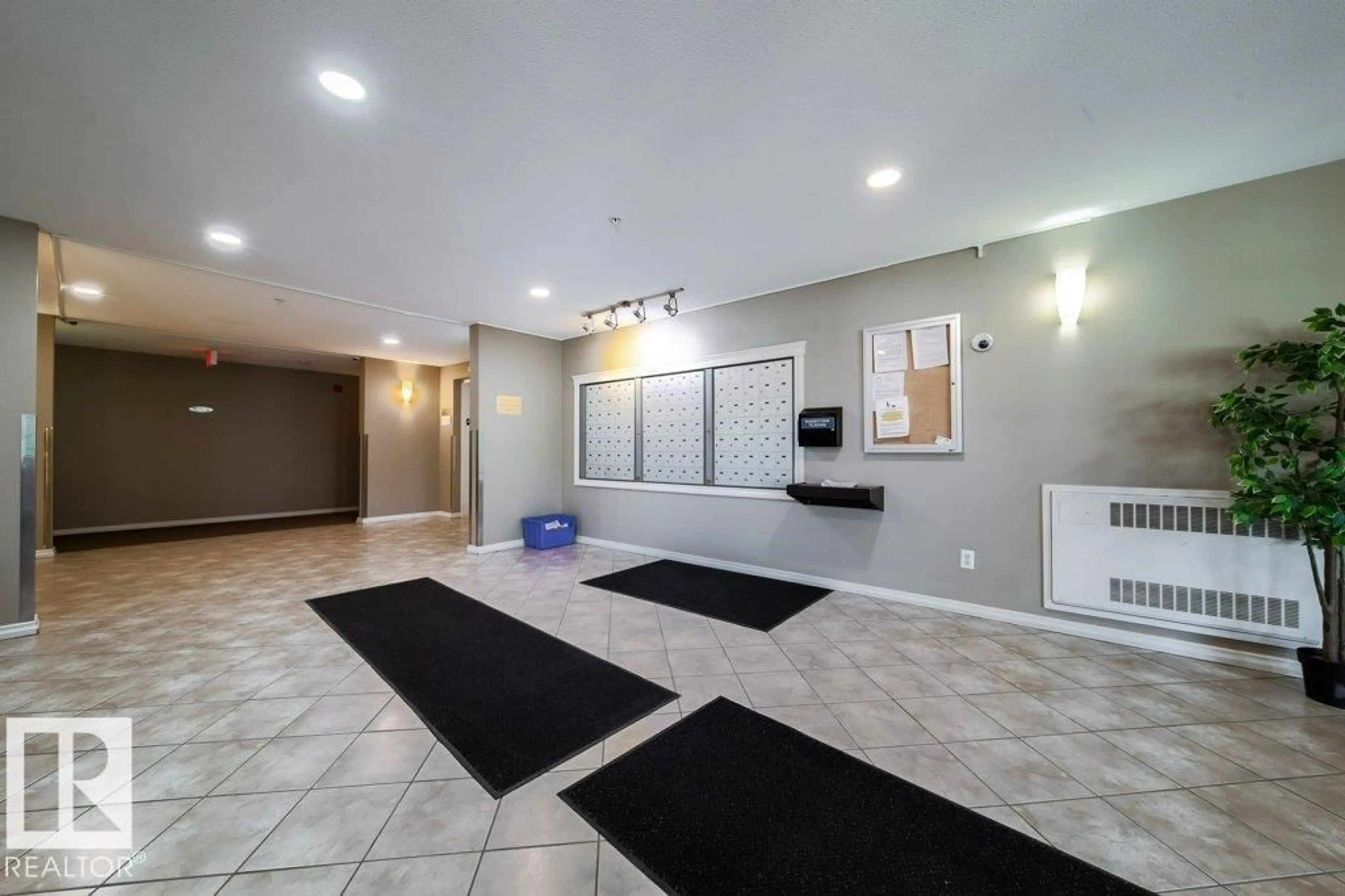 Indoor foyer for 105 - 5951 165 AV, Edmonton Alberta T5Y0J6