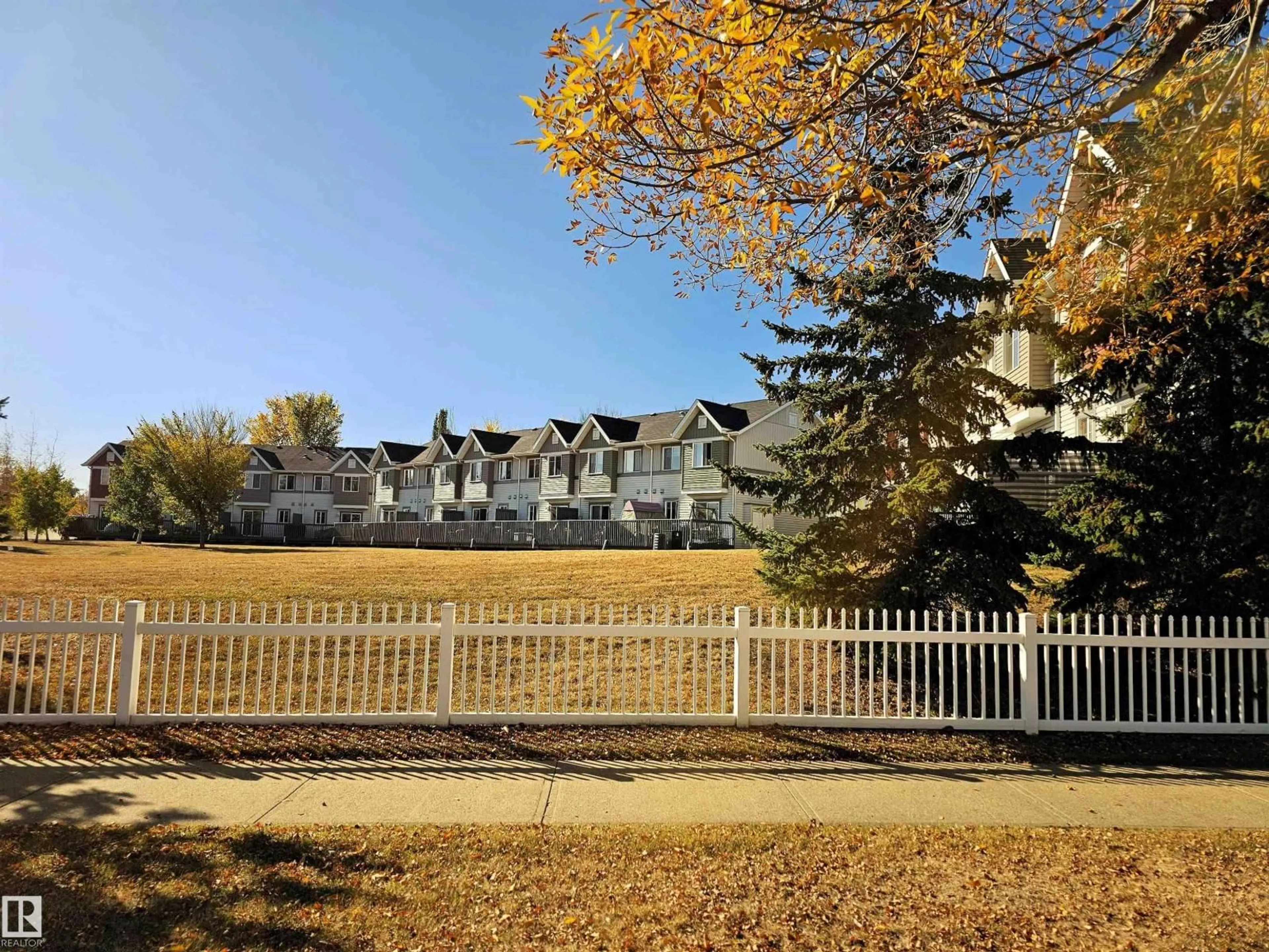 A pic from outside/outdoor area/front of a property/back of a property/a pic from drone, mountain view for 1404 - 29 HERMITAGE RD, Edmonton Alberta T5A0P5