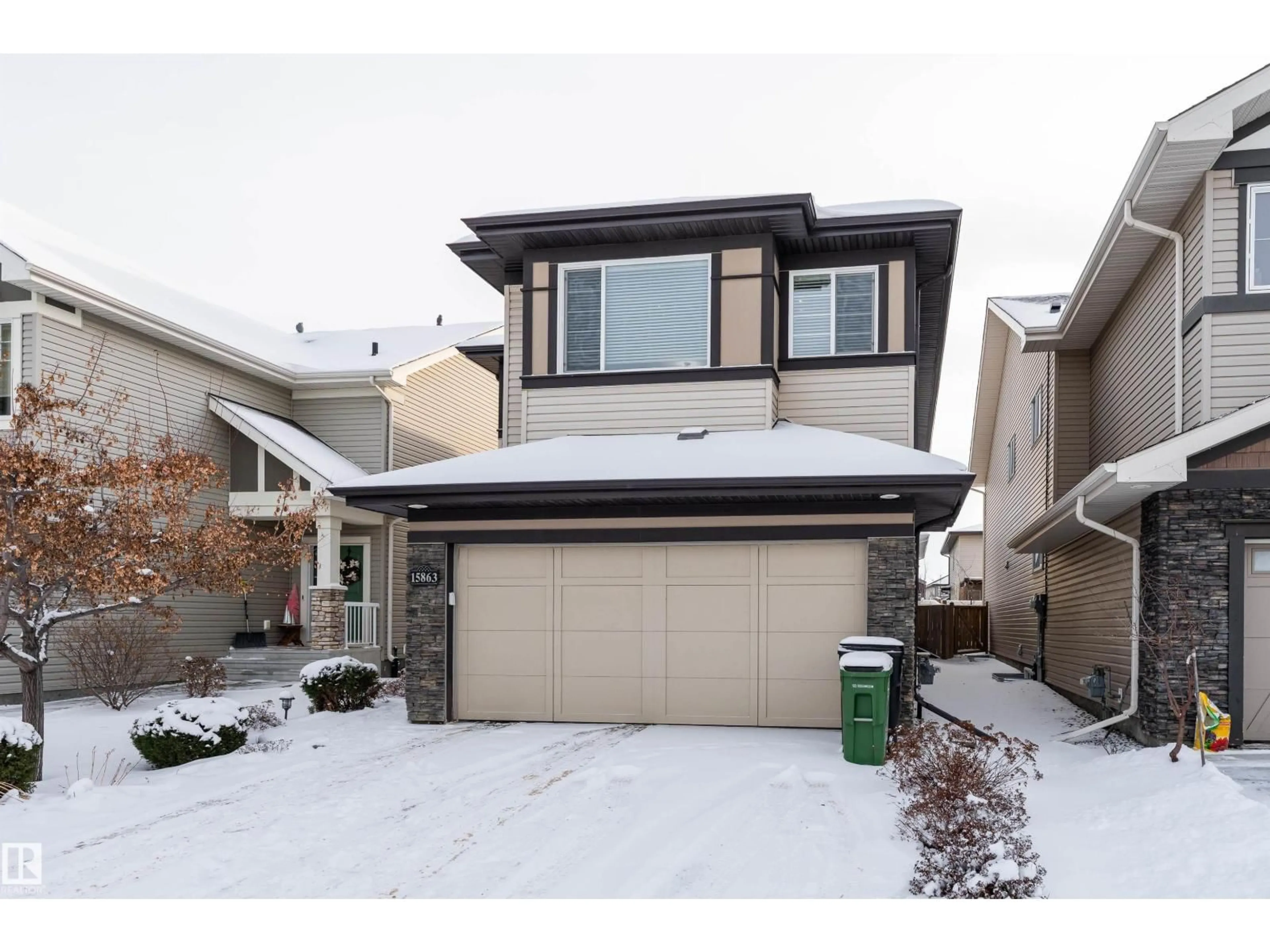 Home with vinyl exterior material, street for 15863 10 AV, Edmonton Alberta T6W2H2