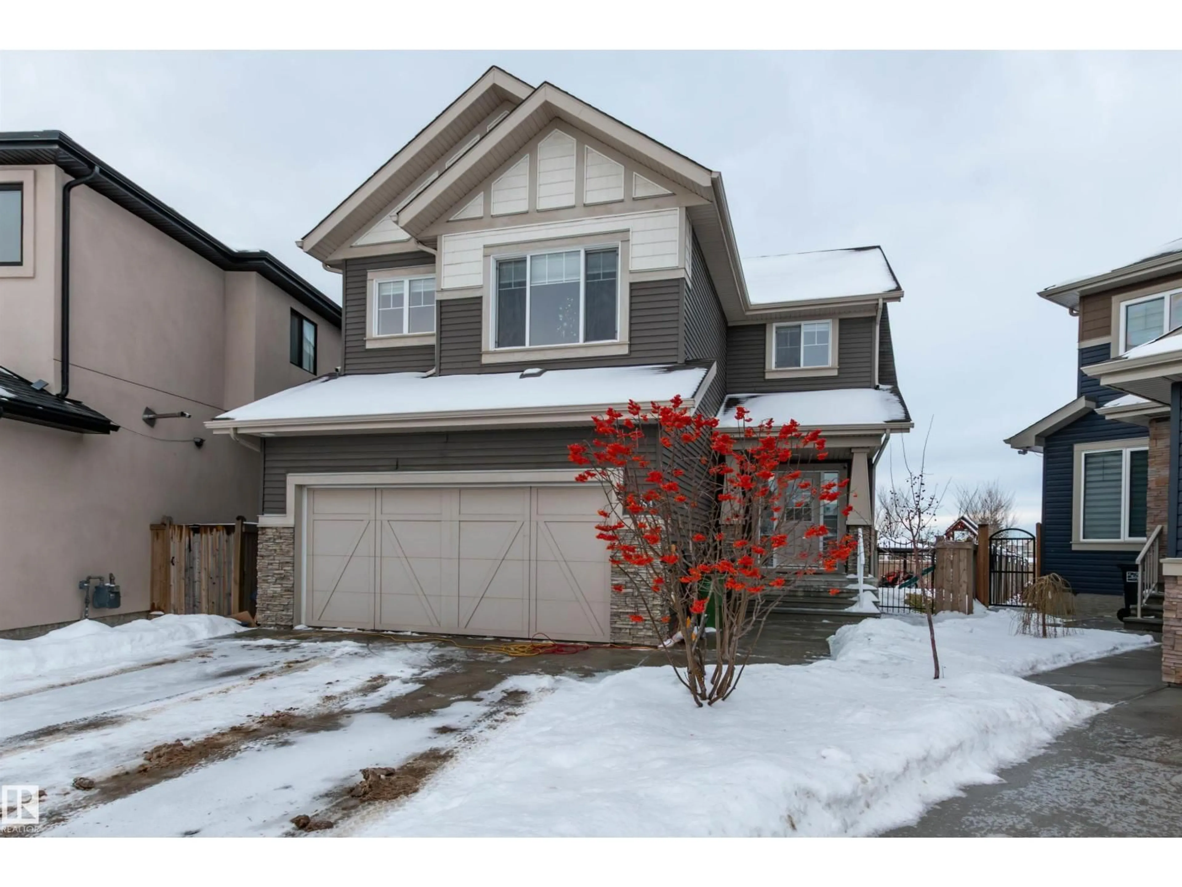 Home with vinyl exterior material, street for NW - 16754 122A ST, Edmonton Alberta T5X0G7