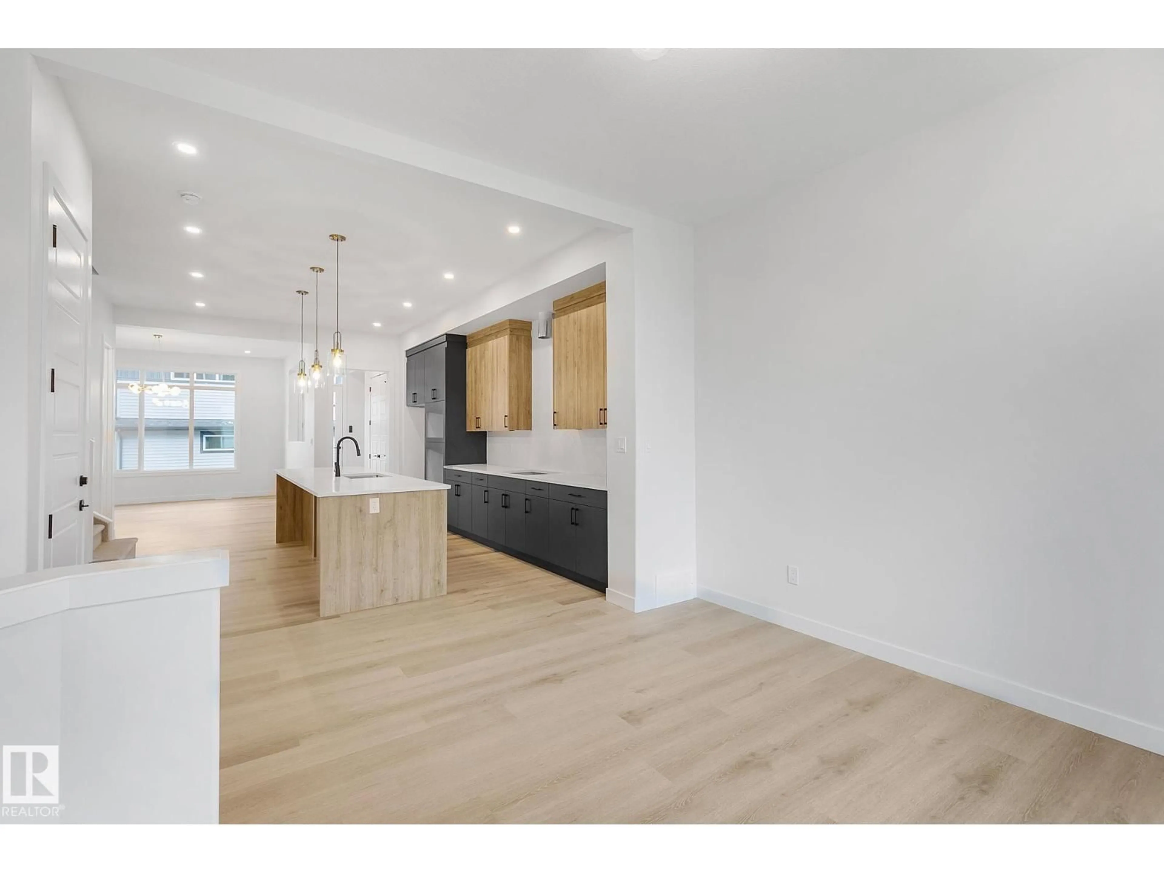 Open concept kitchen, wood/laminate floor for NW - 9926 157 ST, Edmonton Alberta T5P2T6