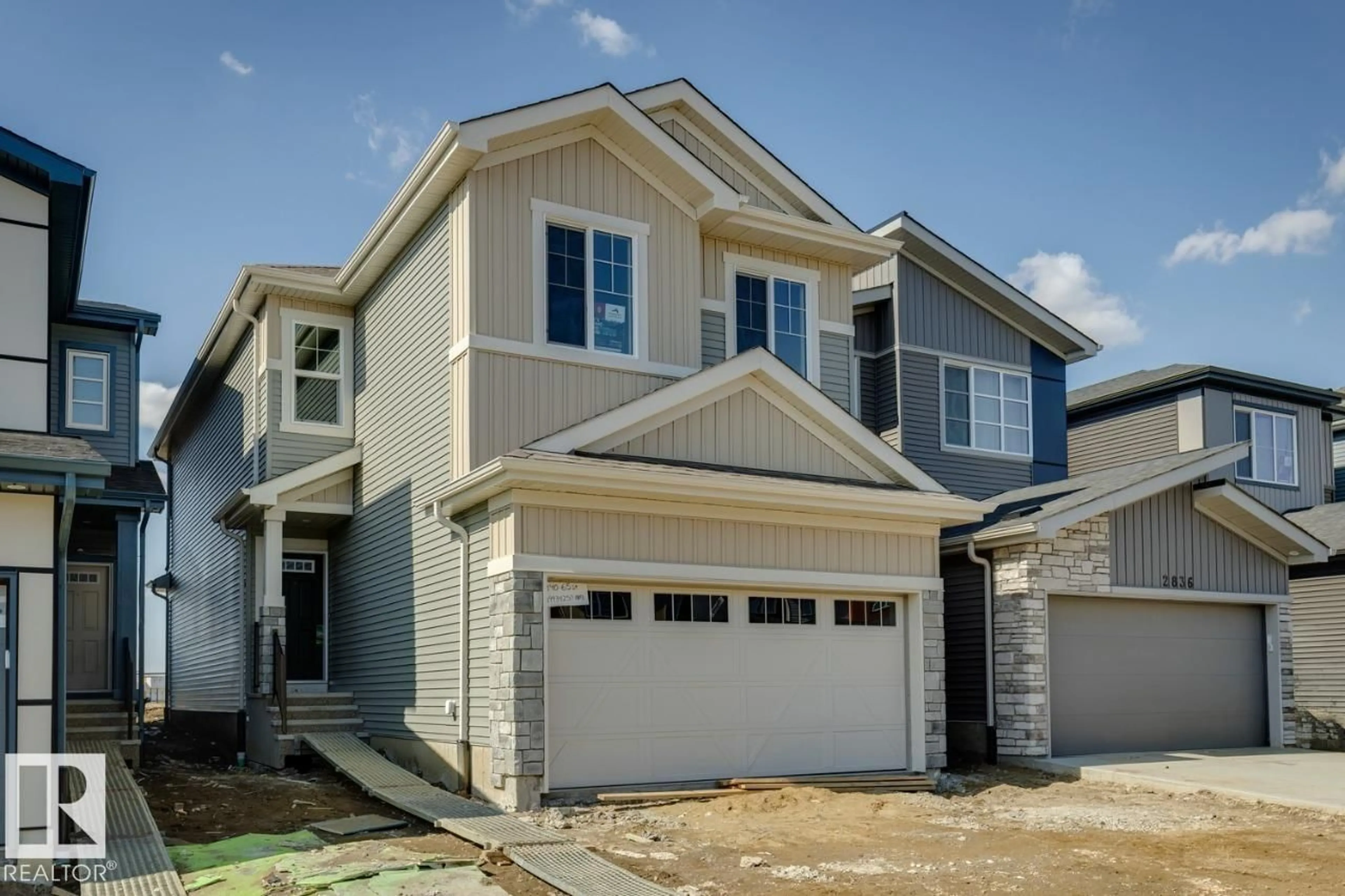 Home with vinyl exterior material, street for 2840 65 ST, Edmonton Alberta T6X1Z4
