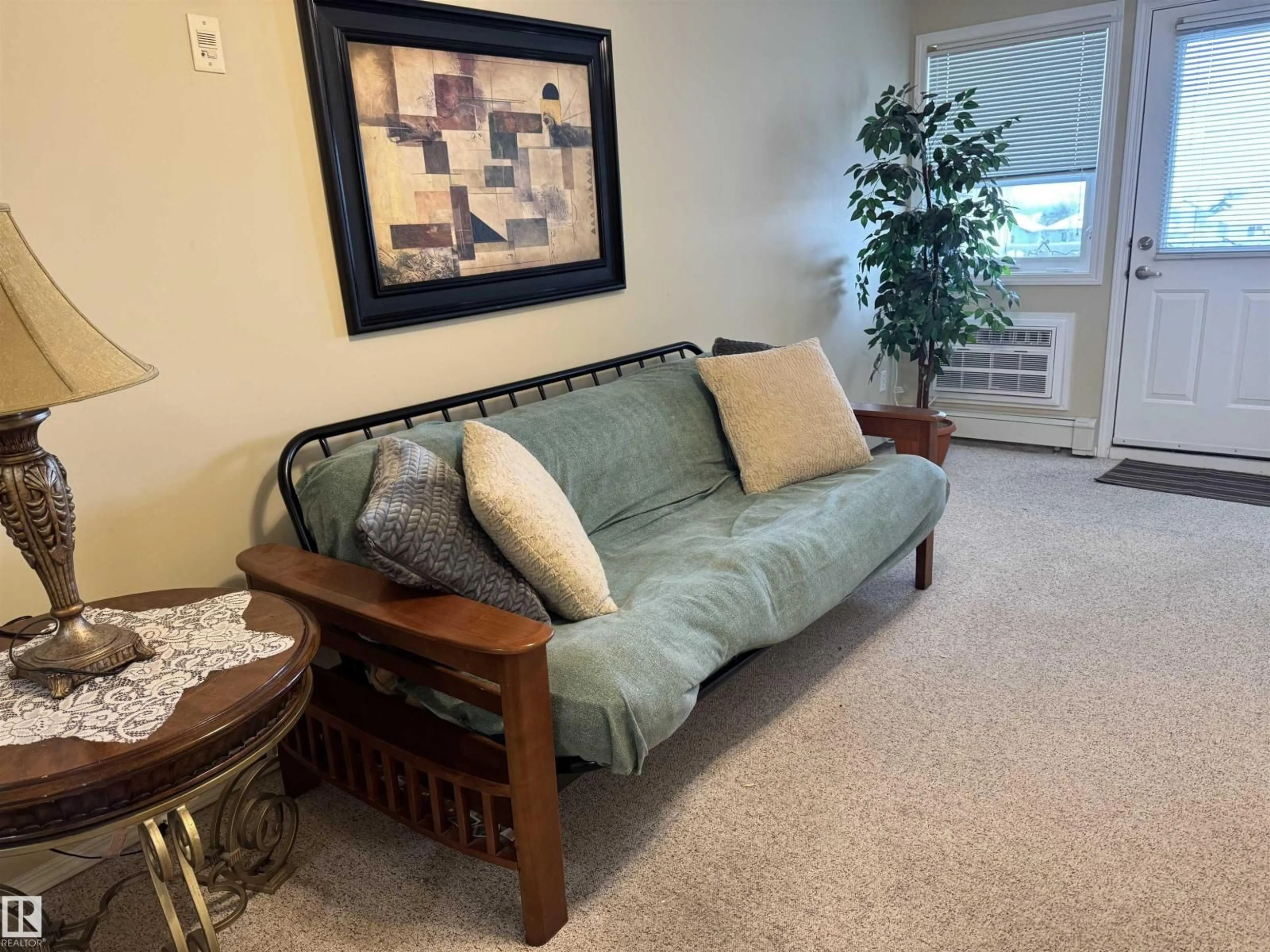 Living room with furniture, carpet floor for #427 - 8802 SOUTHFORT DR, Fort Saskatchewan Alberta T8L4R6