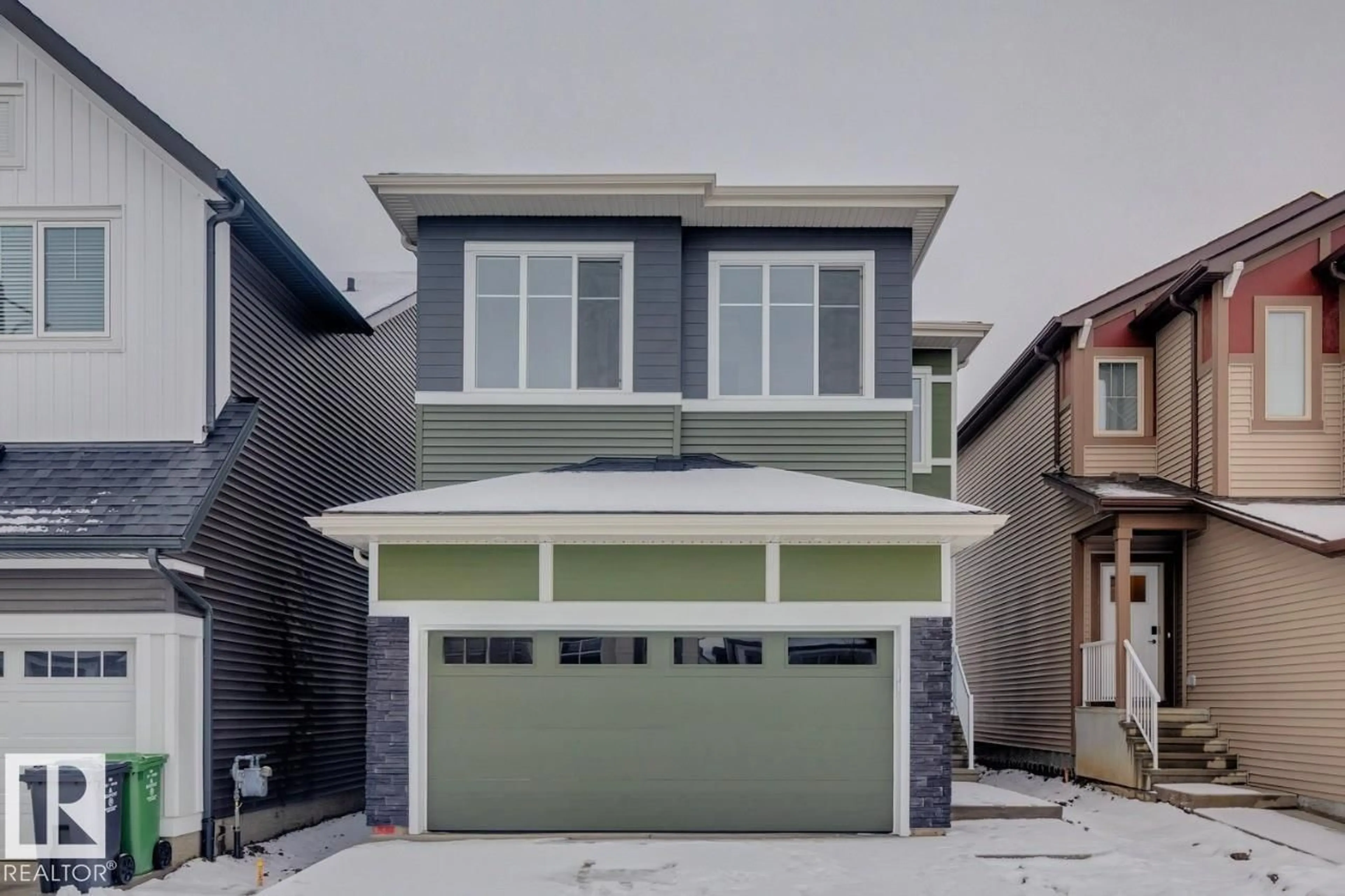 Home with vinyl exterior material, street for 7119 51 AV, Beaumont Alberta T4X3E6