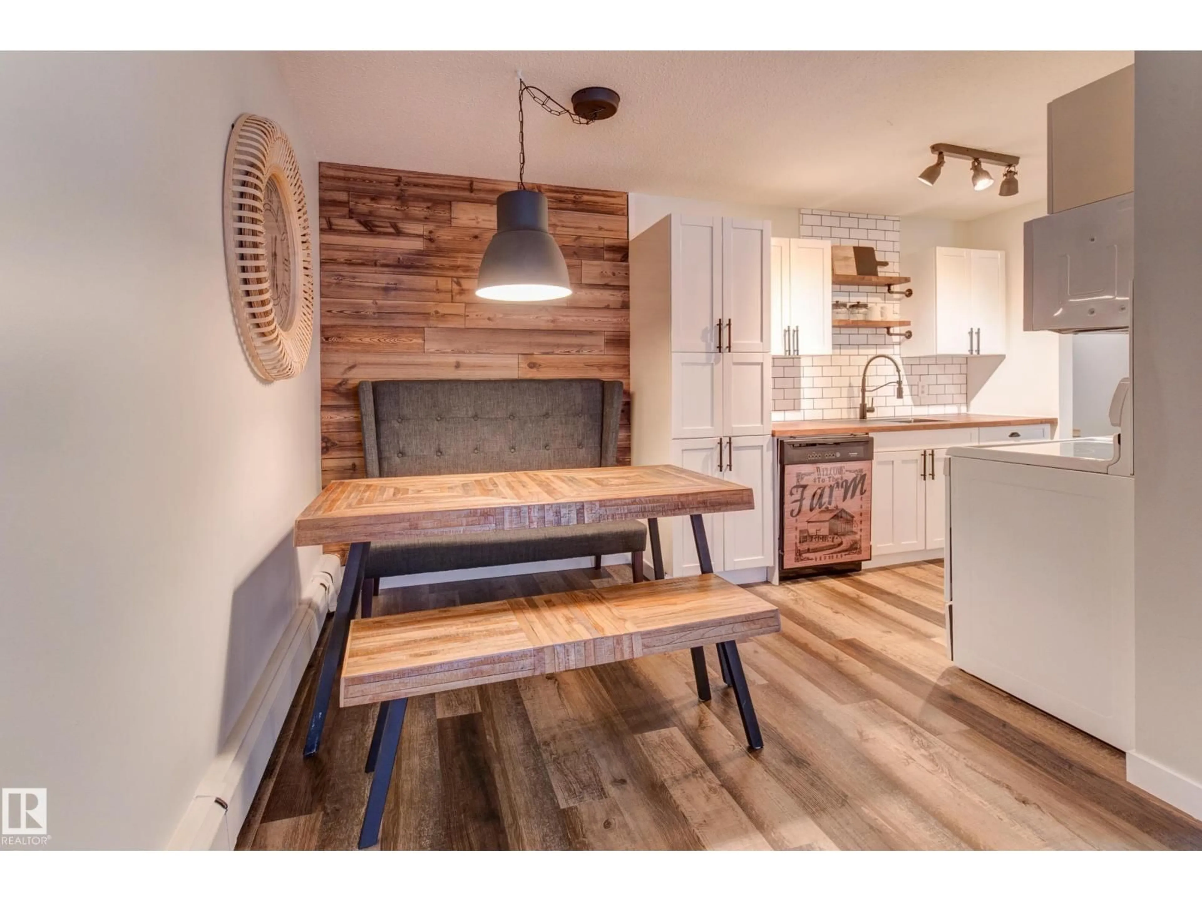 Open concept kitchen, wood/laminate floor for #404 - 10420 93 ST NW, Edmonton Alberta T5H1X4