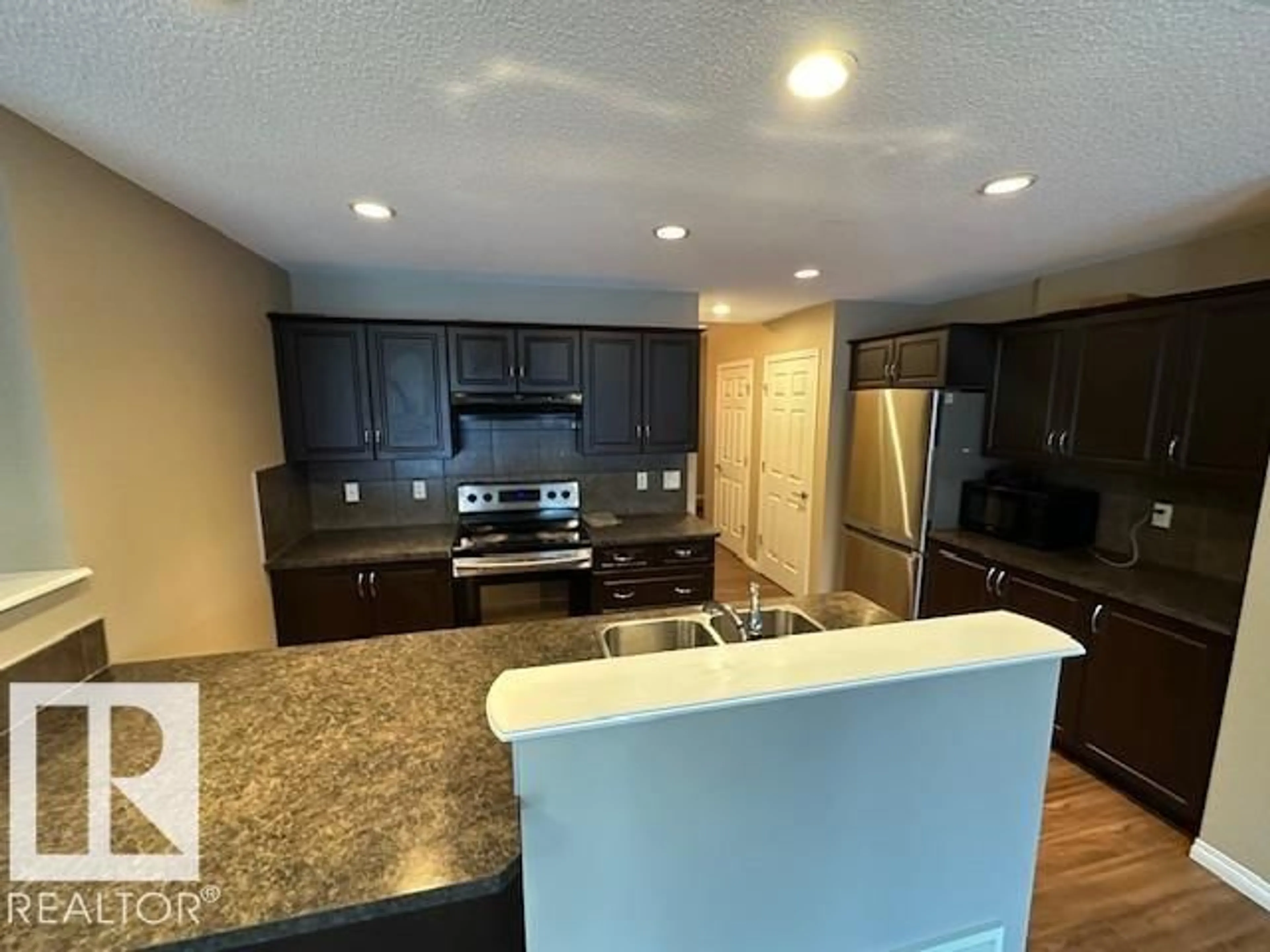 Open concept kitchen, ceramic/tile floor for SW - 3117 ARTHURS CR, Edmonton Alberta T6W2H7