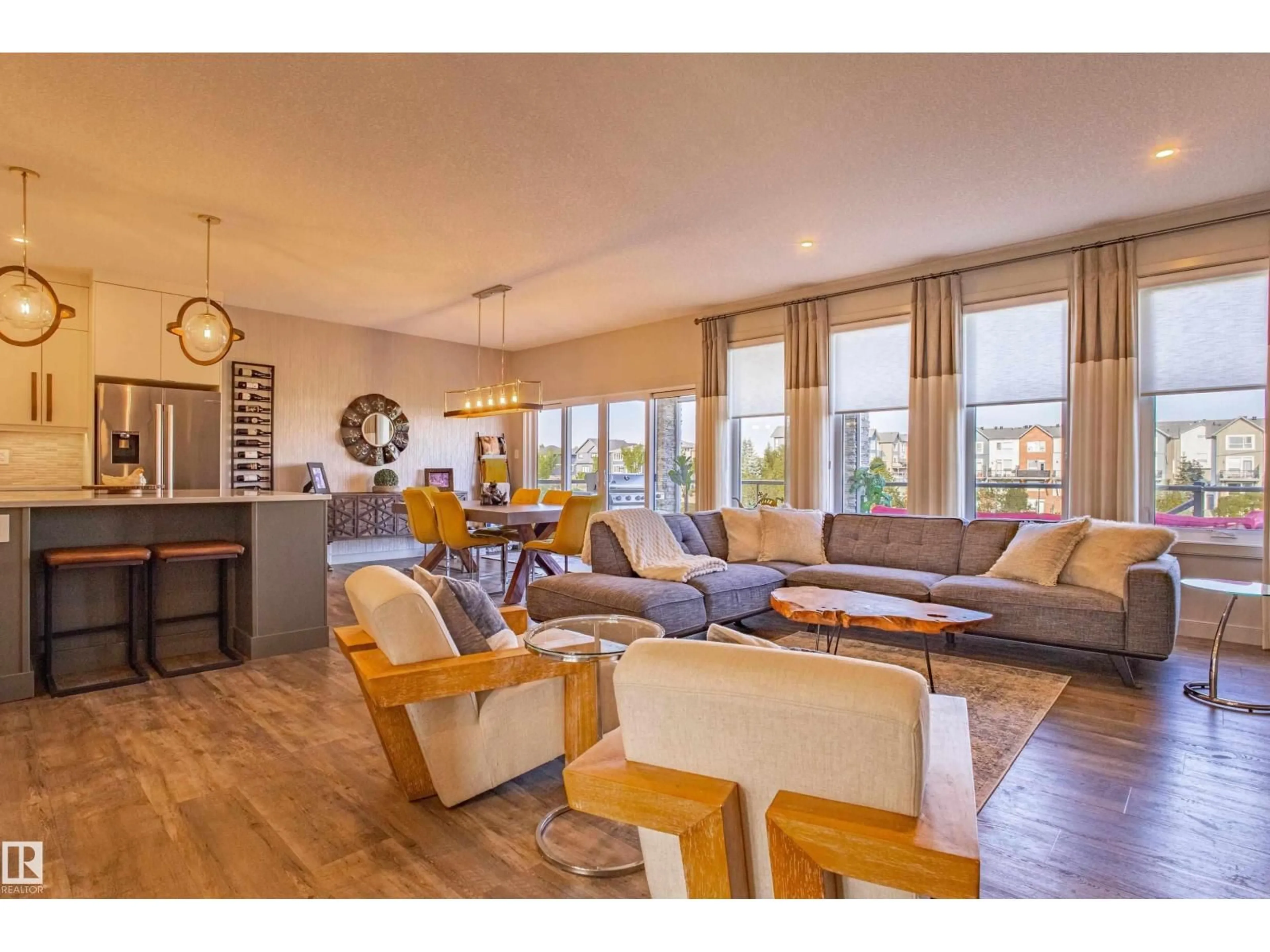 Living room with furniture, wood/laminate floor for 6013 NADEN LD, Edmonton Alberta T5E6X6