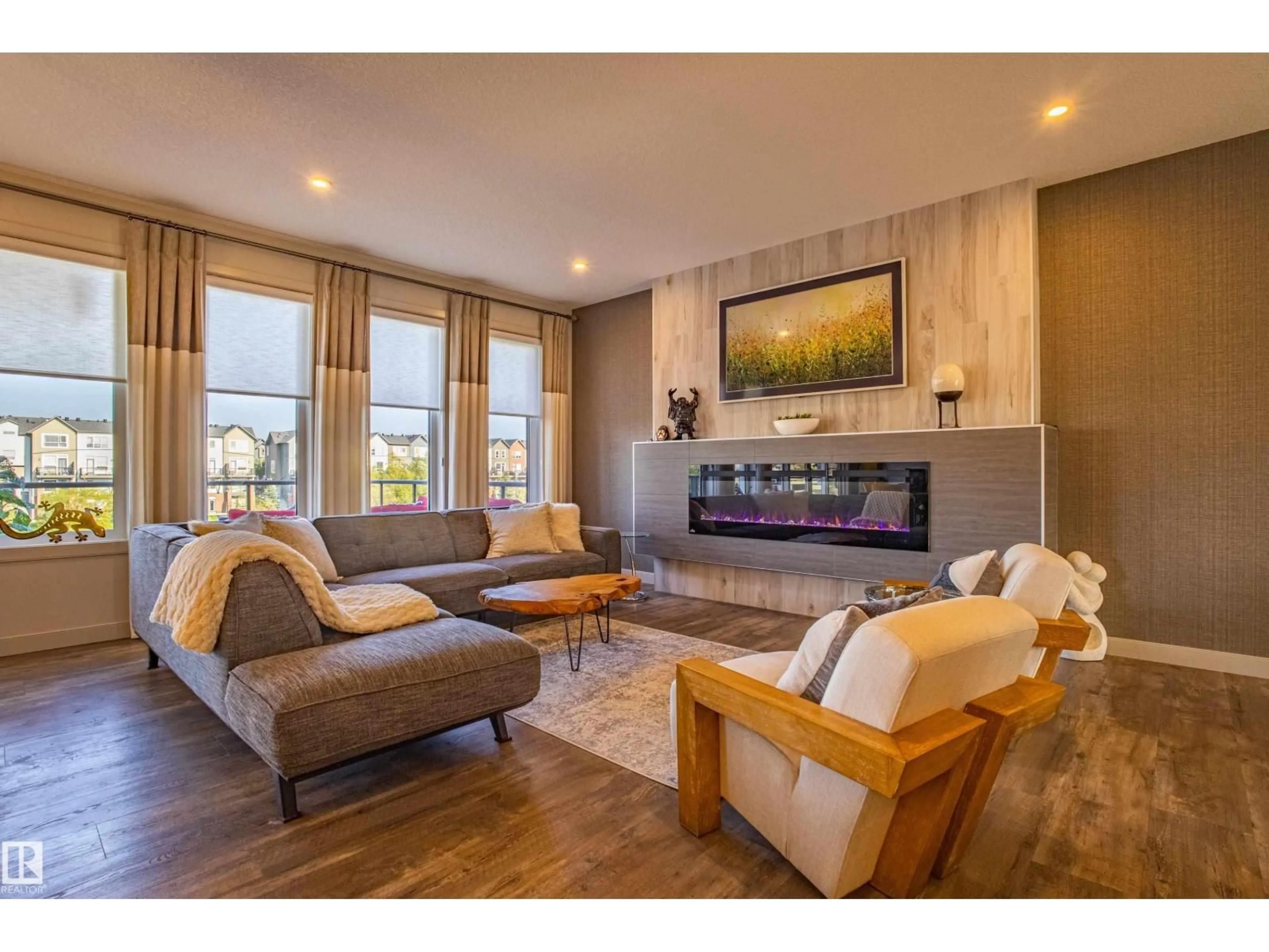 Living room with furniture, wood/laminate floor for 6013 NADEN LD, Edmonton Alberta T5E6X6