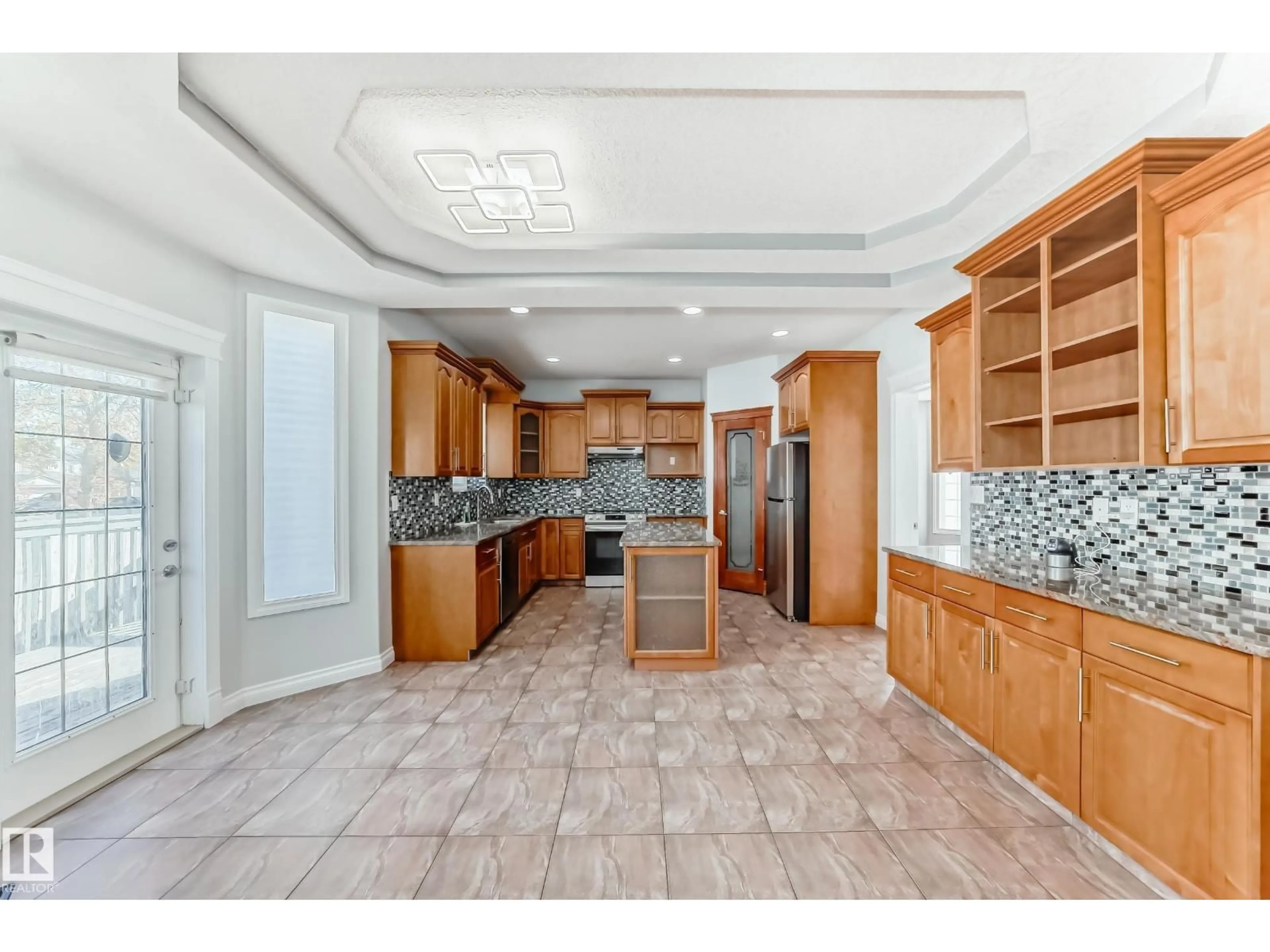 Open concept kitchen, ceramic/tile floor for 16003 134 ST NW, Edmonton Alberta T6V0B9