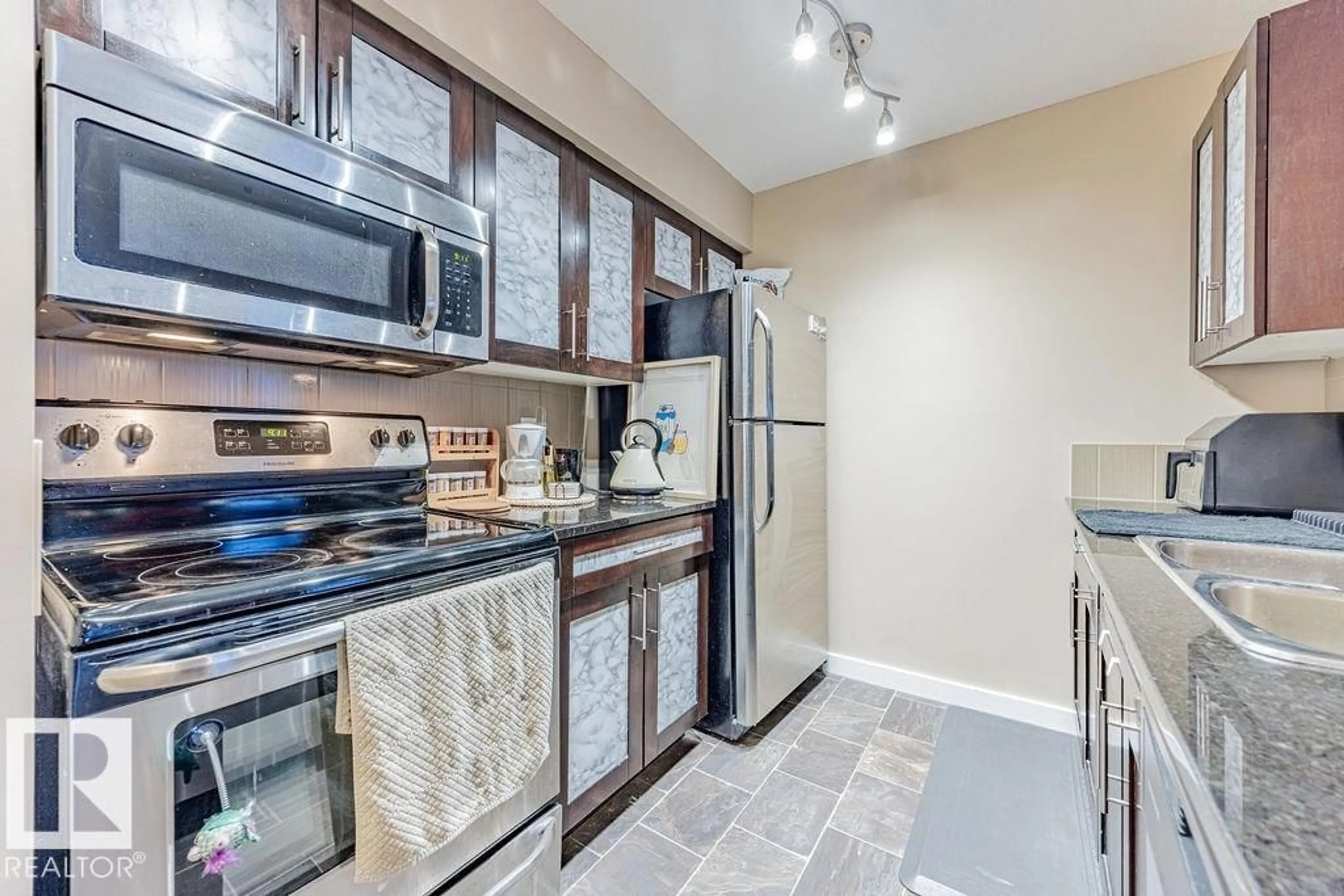 Standard kitchen, ceramic/tile floor for 310 - 12025 22 AV, Edmonton Alberta T6W2Y1