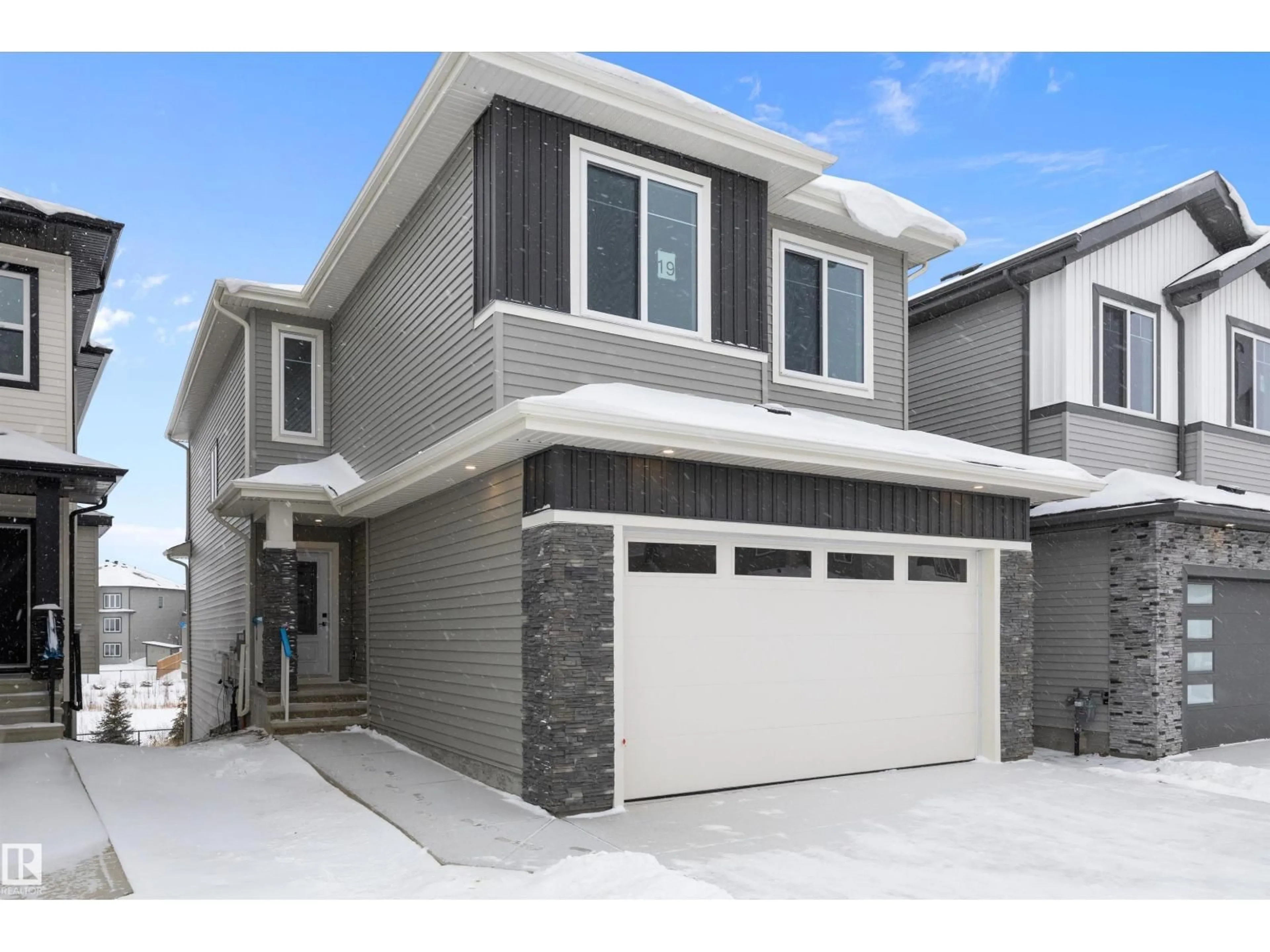 Home with vinyl exterior material, street for 19 AXELWOOD CR, Spruce Grove Alberta T7X4G4