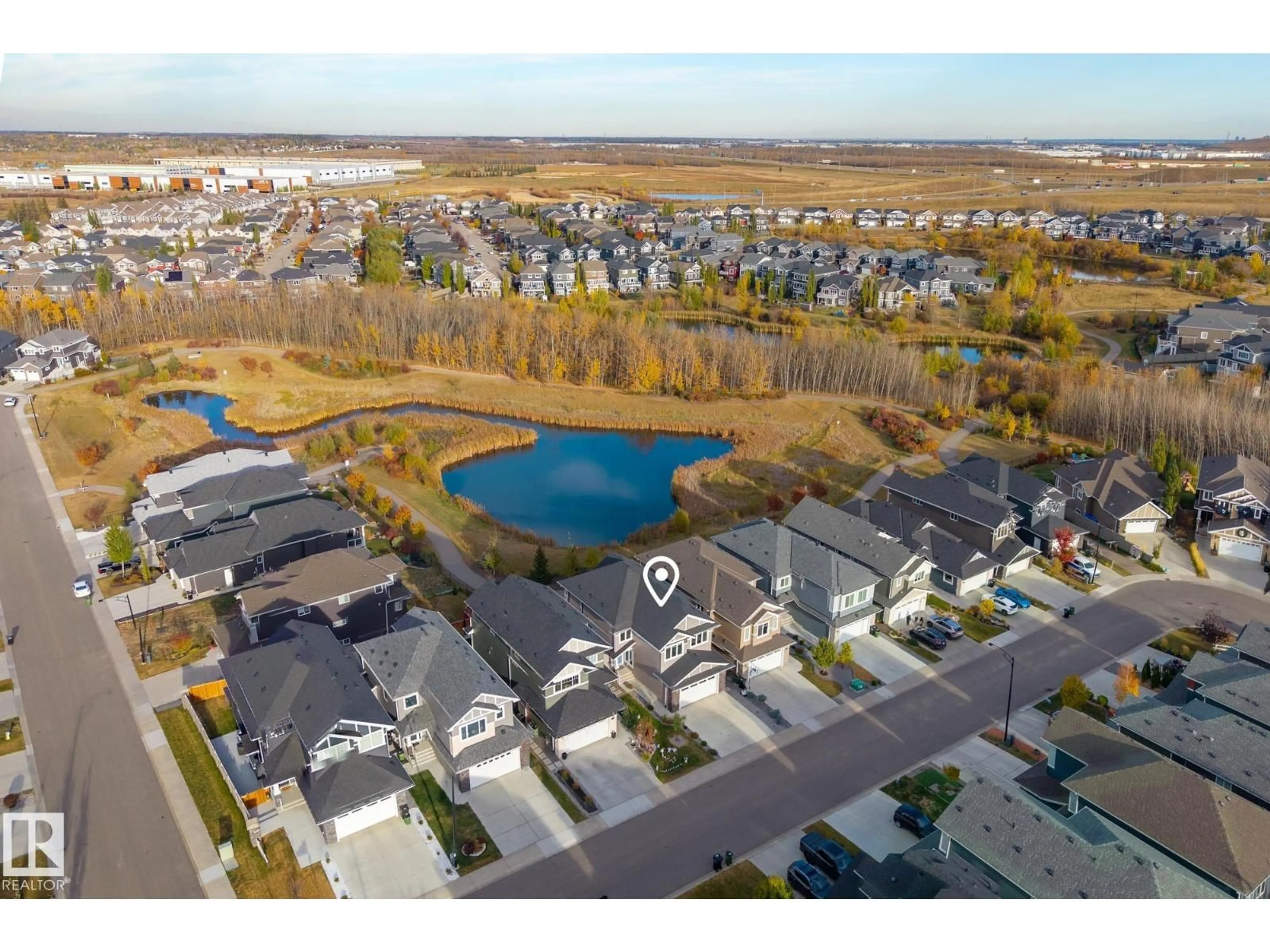 A pic from outside/outdoor area/front of a property/back of a property/a pic from drone, water/lake/river/ocean view for 3419 CHICKADEE DR, Edmonton Alberta T5A0L1