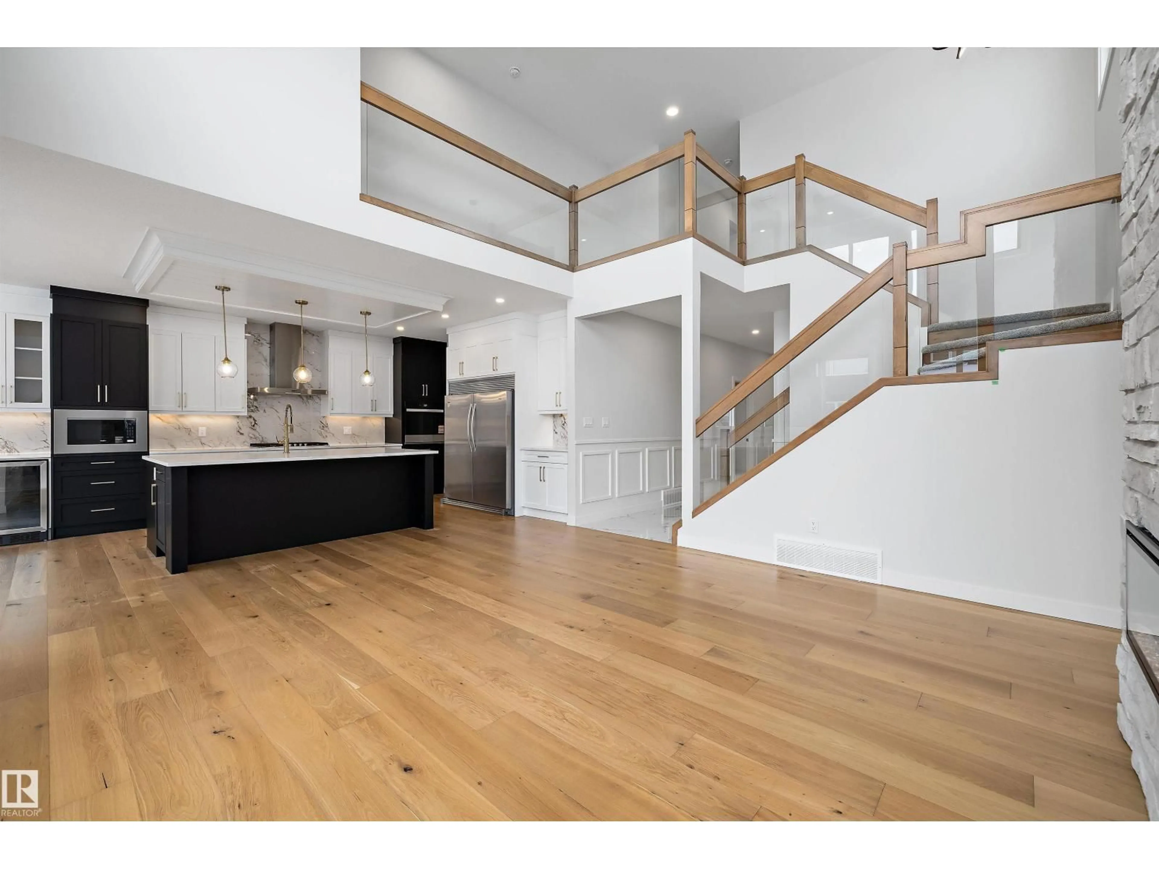 Open concept kitchen, wood/laminate floor for 6872 KNOX LO SW, Edmonton Alberta T6W4R4