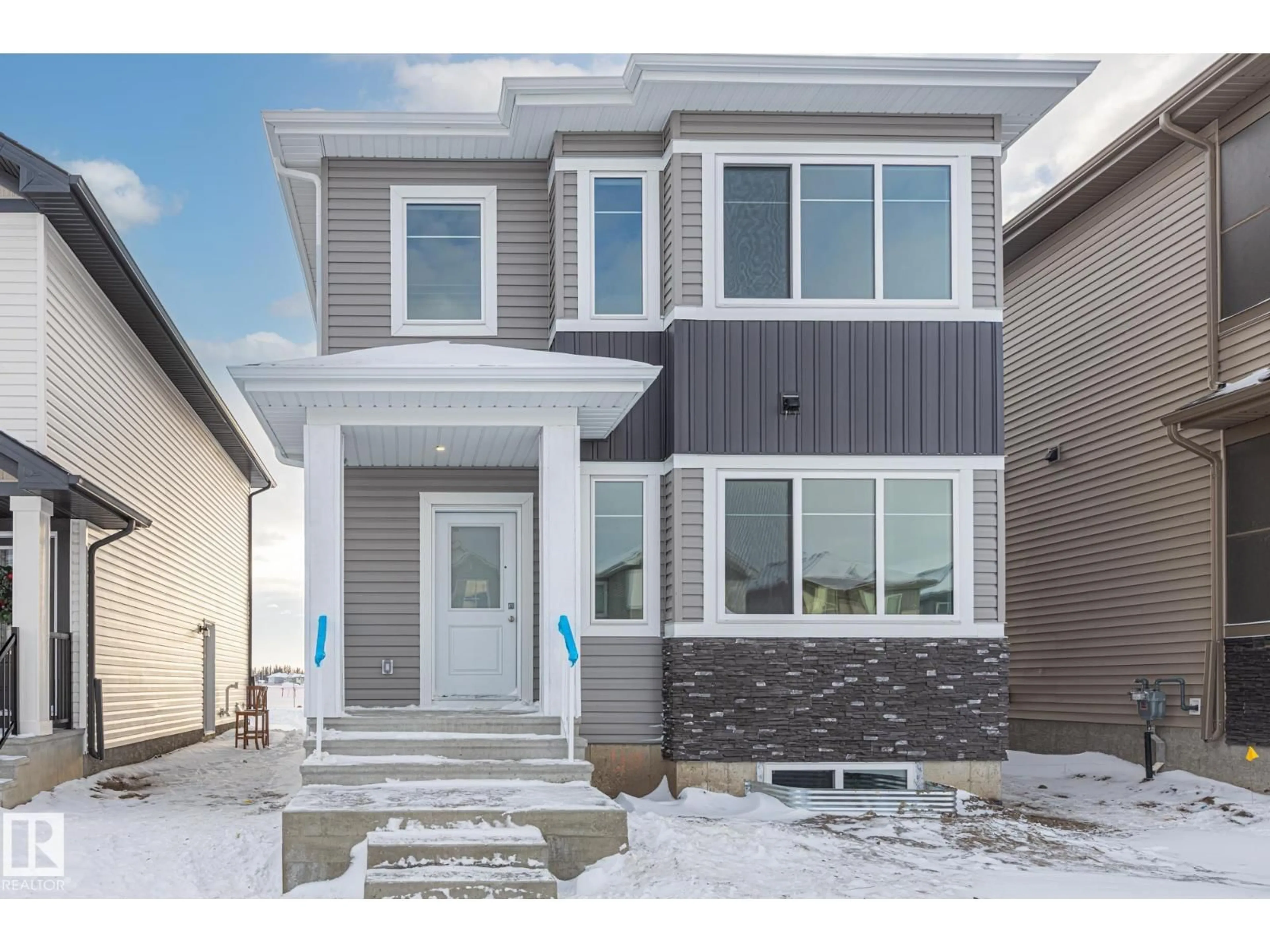 Home with vinyl exterior material, street for 49 FICUS WY, Fort Saskatchewan Alberta T8L0Z6