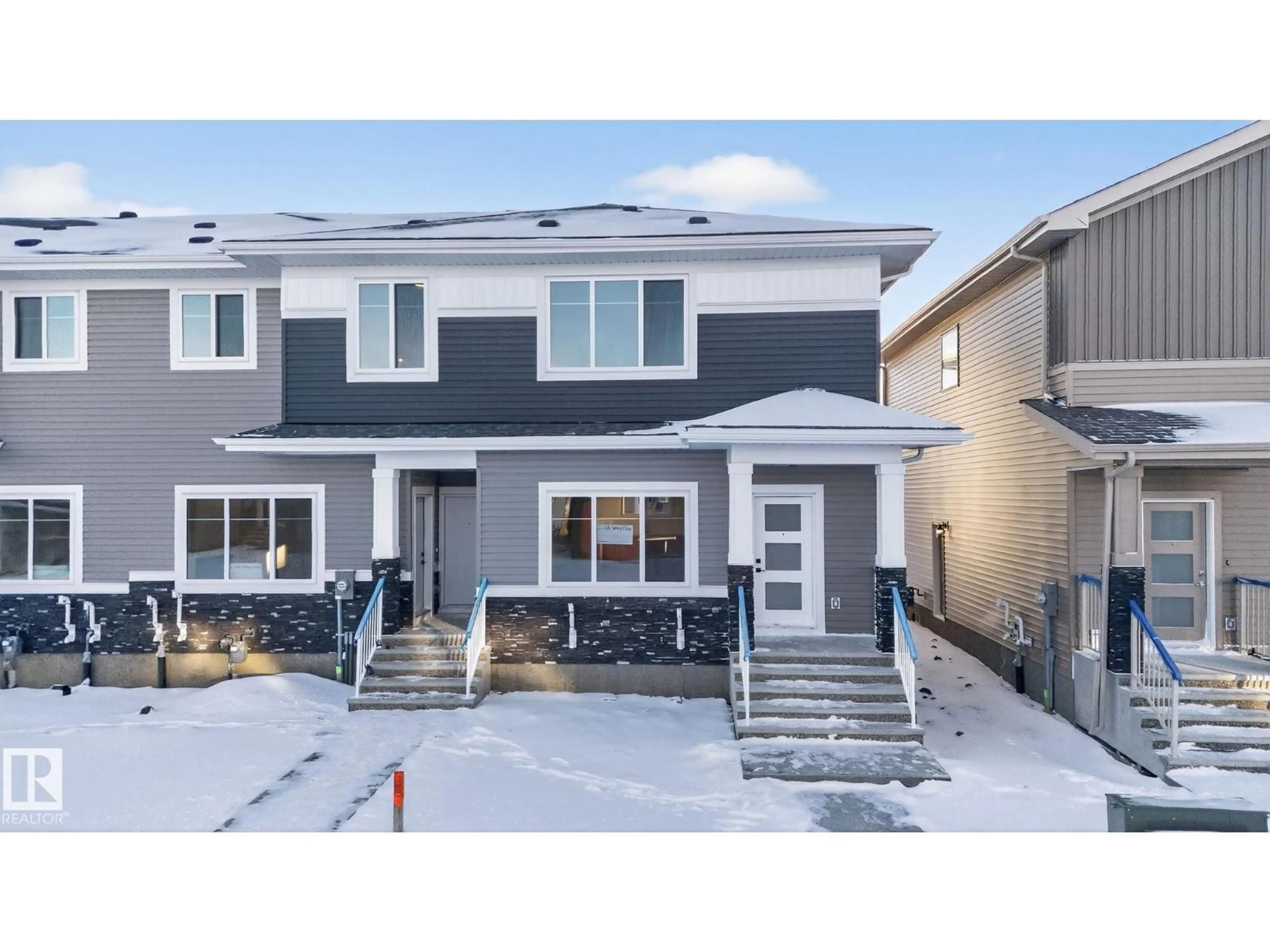 Home with vinyl exterior material, street for 128 PIERWYCK LO, Spruce Grove Alberta T7X4G2