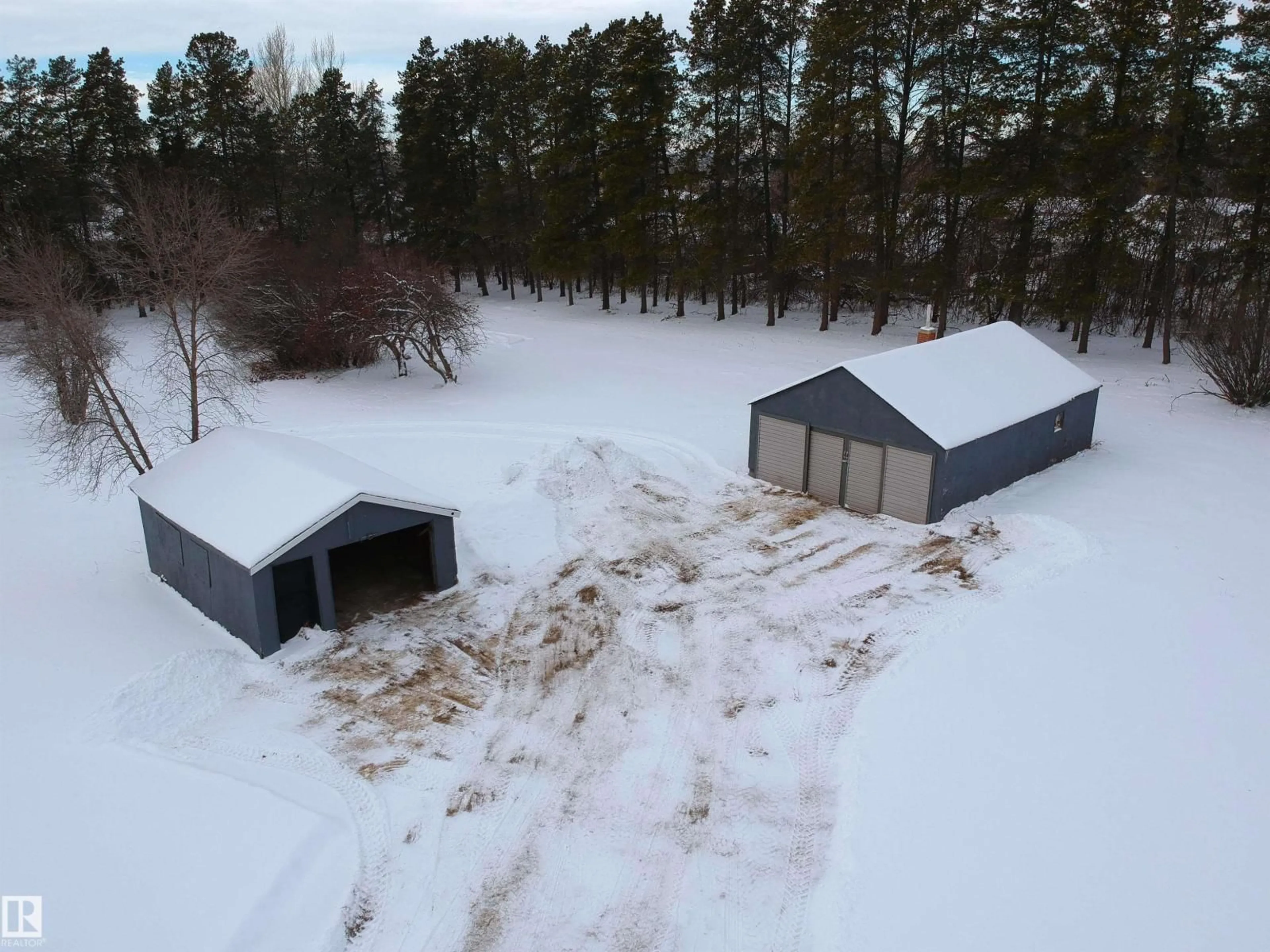 A pic from outside/outdoor area/front of a property/back of a property/a pic from drone, building for 5203 51A AV, Rural Sturgeon County Alberta T0A0K0