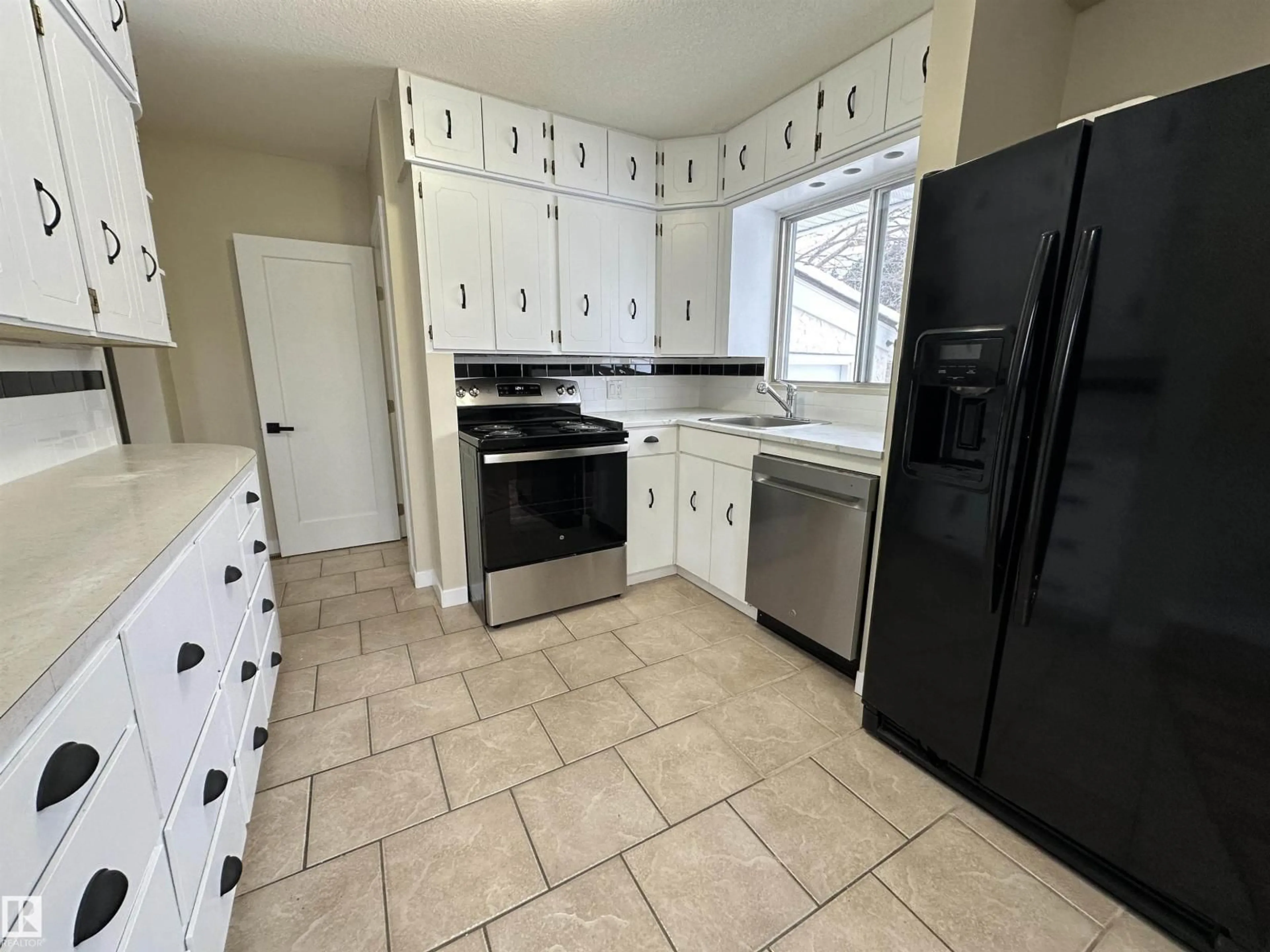 Standard kitchen, ceramic/tile floor for 5203 51A AV, Rural Sturgeon County Alberta T0A0K0