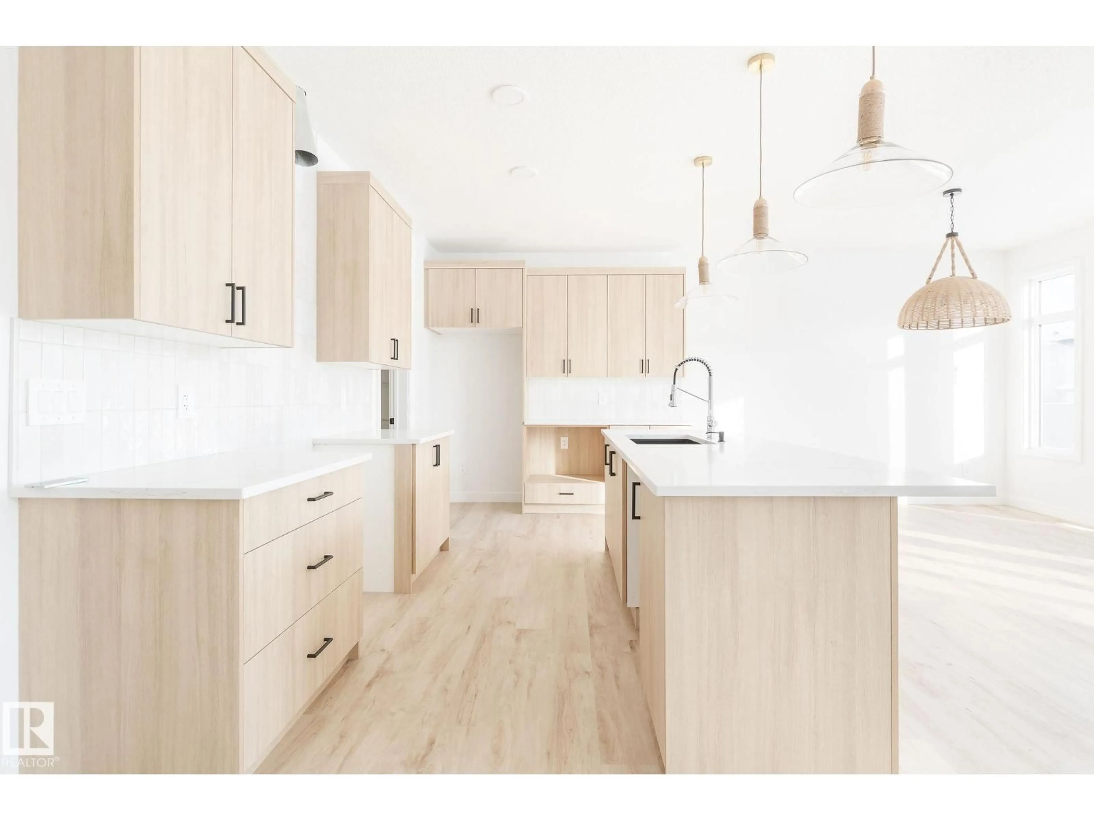 Open concept kitchen, wood/laminate floor for 20624 43 AV, Edmonton Alberta T6M3E3