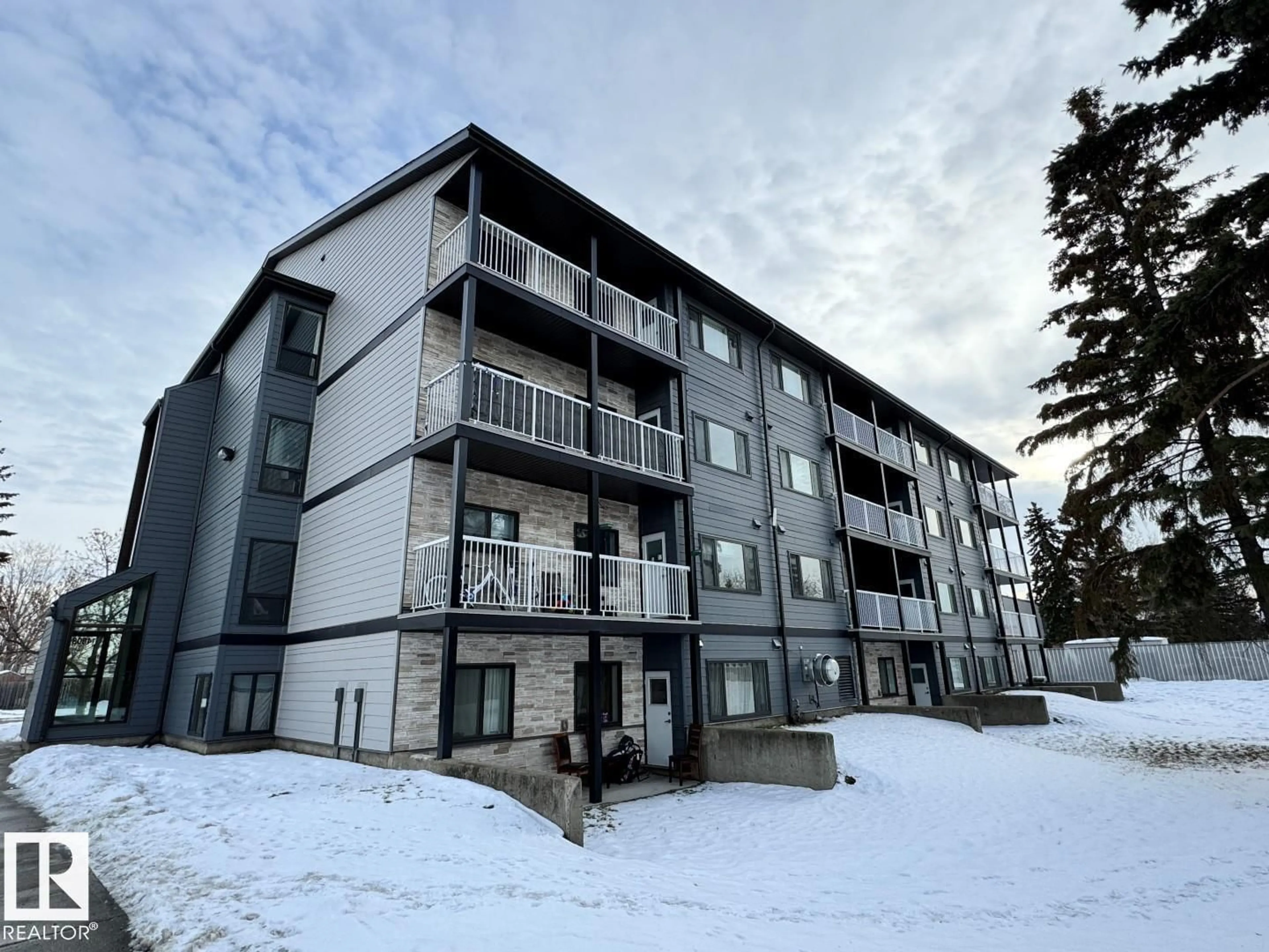 A pic from outside/outdoor area/front of a property/back of a property/a pic from drone, building for #108 - 14808 26 ST, Edmonton Alberta T5Y2G4