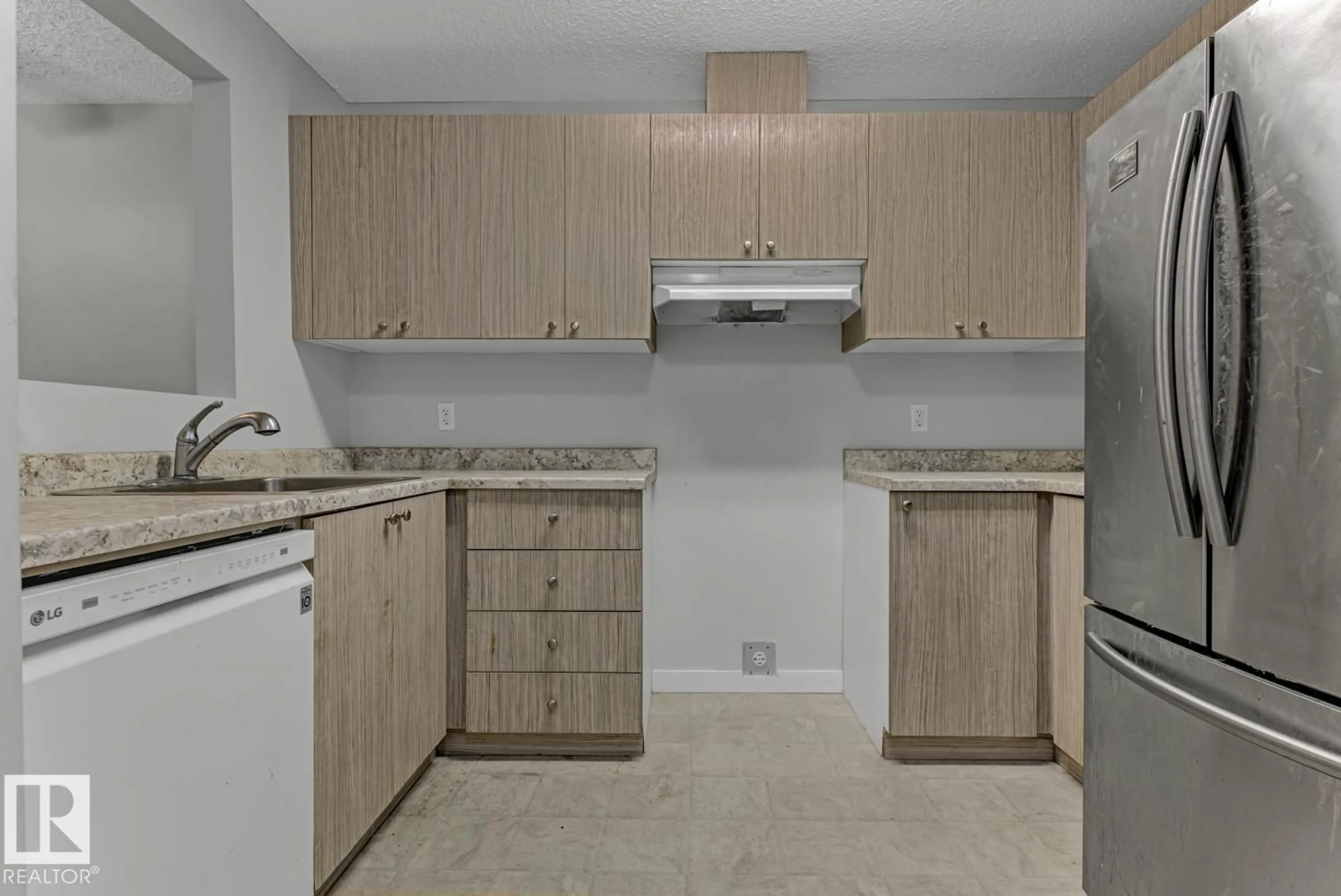Standard kitchen, unknown for #108 - 14808 26 ST, Edmonton Alberta T5Y2G4