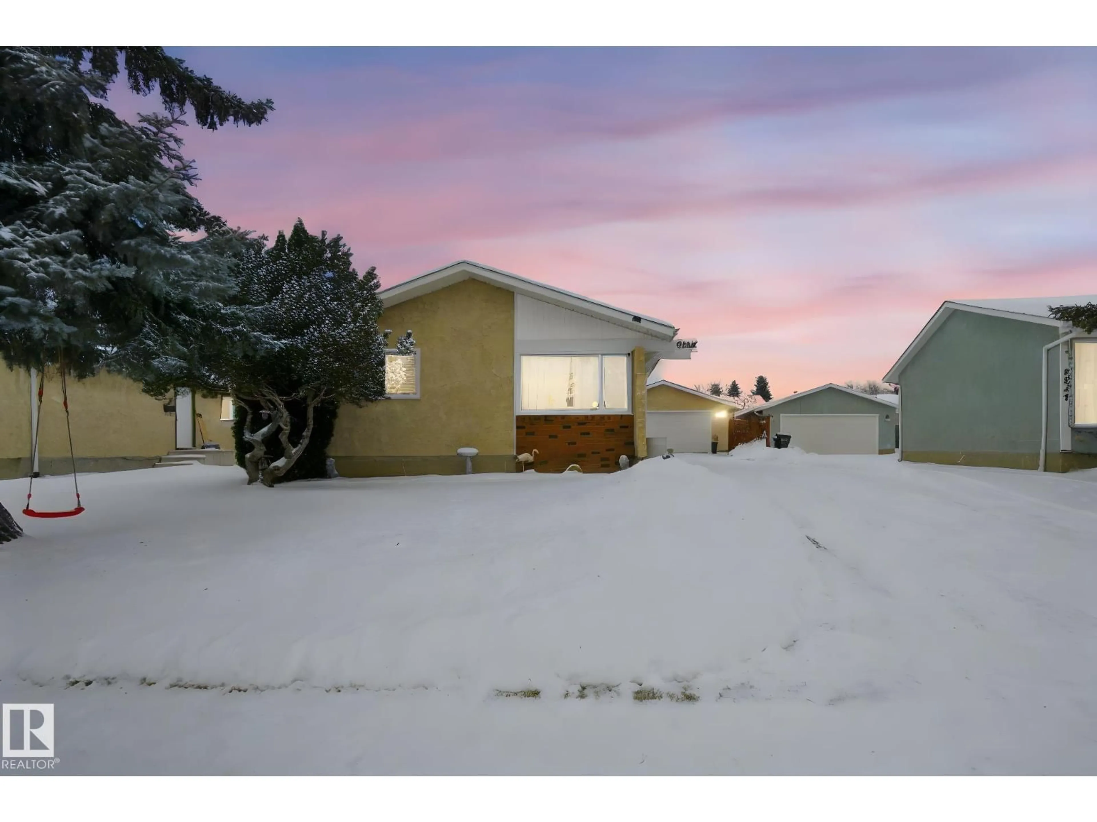 A pic from outside/outdoor area/front of a property/back of a property/a pic from drone, mountain view for NW - 9904 171 AV, Edmonton Alberta T5X3G4