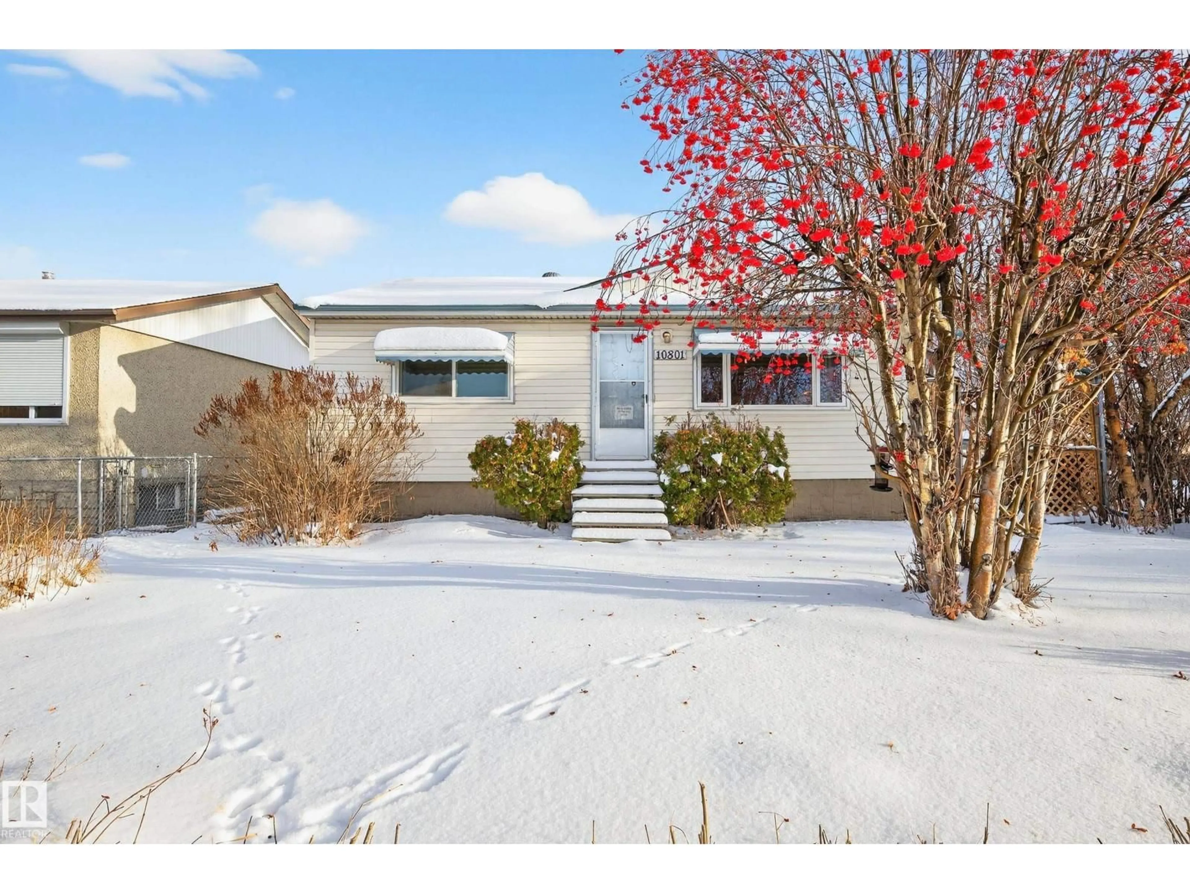 Home with vinyl exterior material, street for NW - 10801 156 ST, Edmonton Alberta T5P2S5