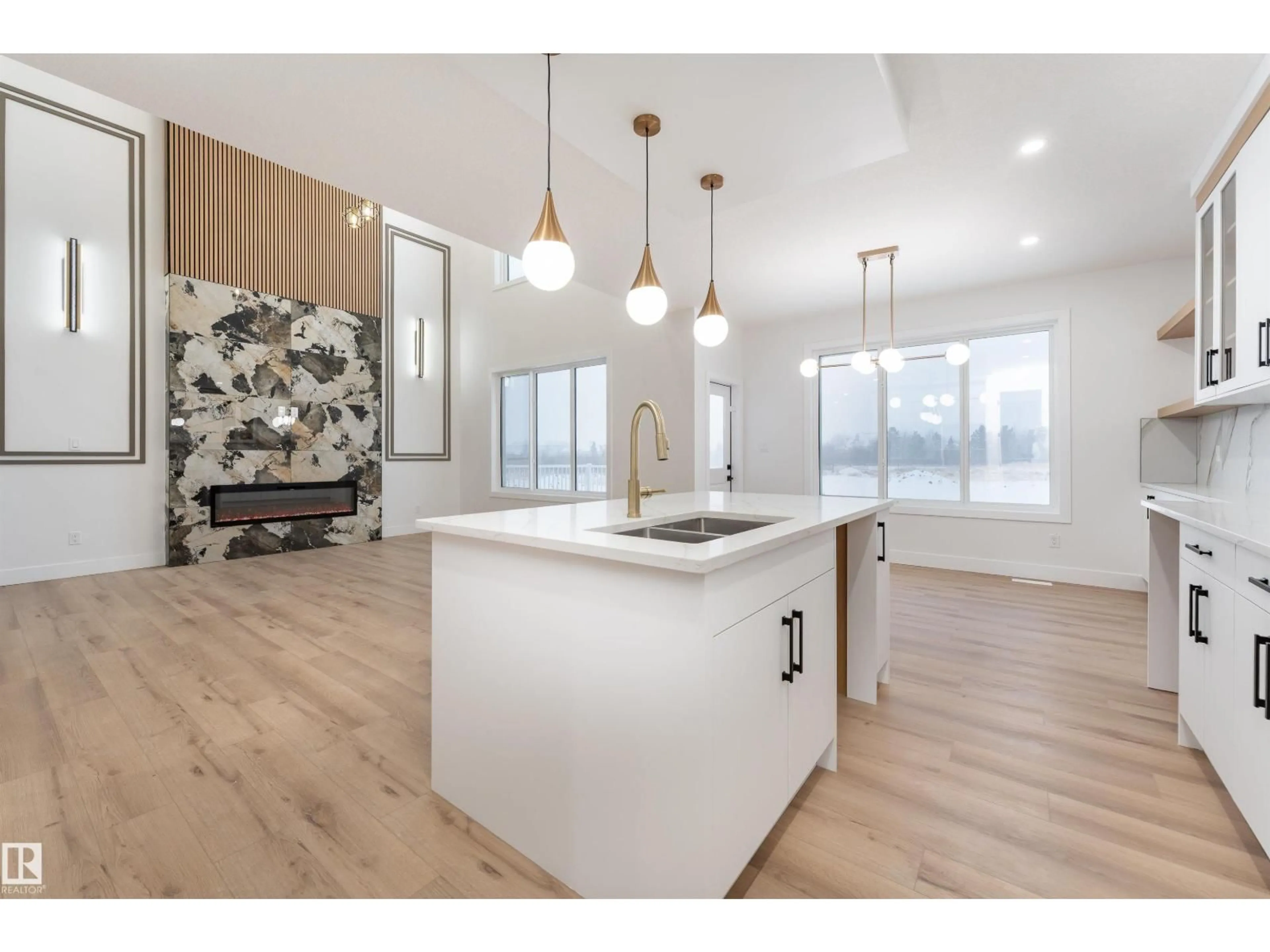 Open concept kitchen, wood/laminate floor for NE - 2402 63 AV, Rural Leduc County Alberta T4X0K5