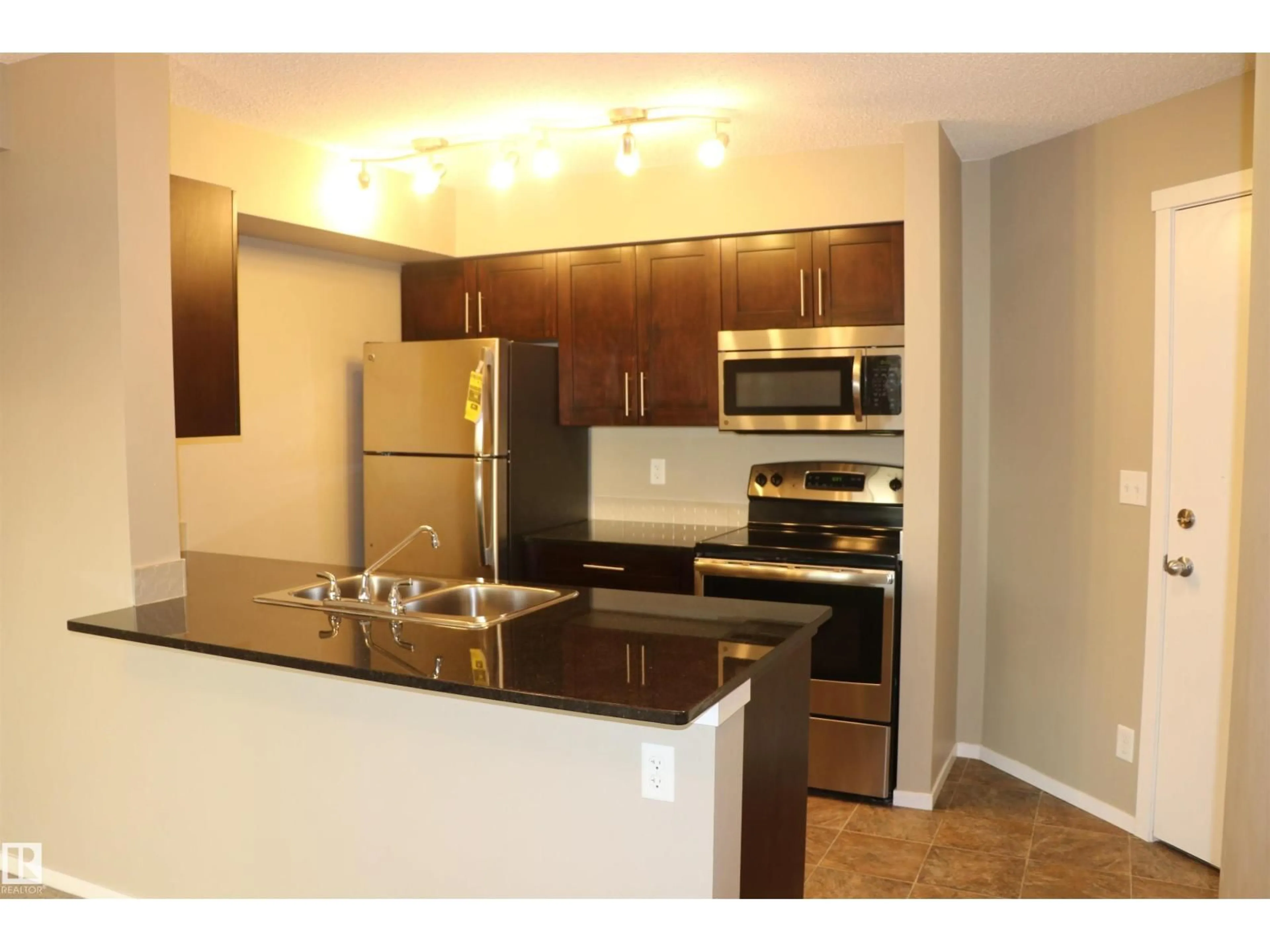Standard kitchen, wood/laminate floor for #312 - 3207 JAMES MOWATT TRAIL, Edmonton Alberta T6W3L6