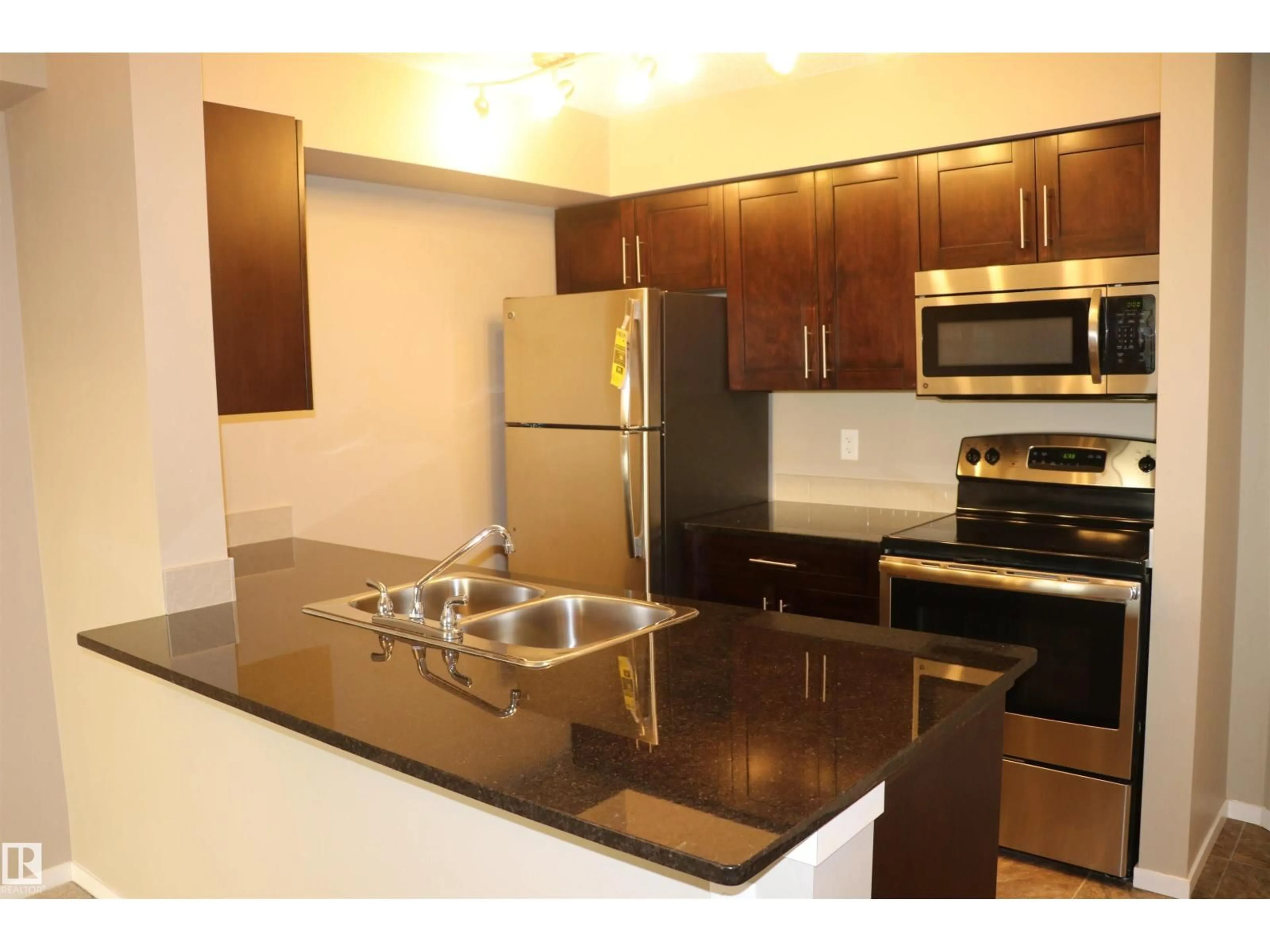 Standard kitchen, wood/laminate floor for #312 - 3207 JAMES MOWATT TRAIL, Edmonton Alberta T6W3L6