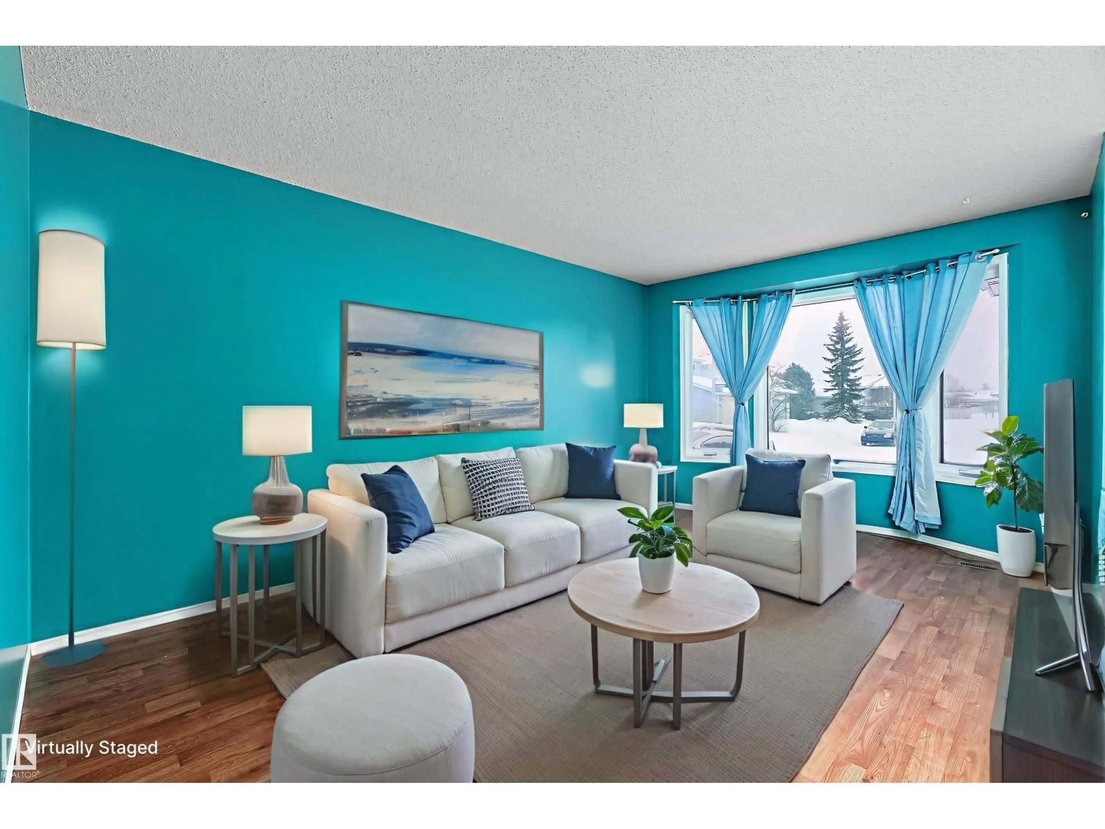 Living room with furniture, wood/laminate floor for 128 WARWICK CR, Edmonton Alberta T5X5P3